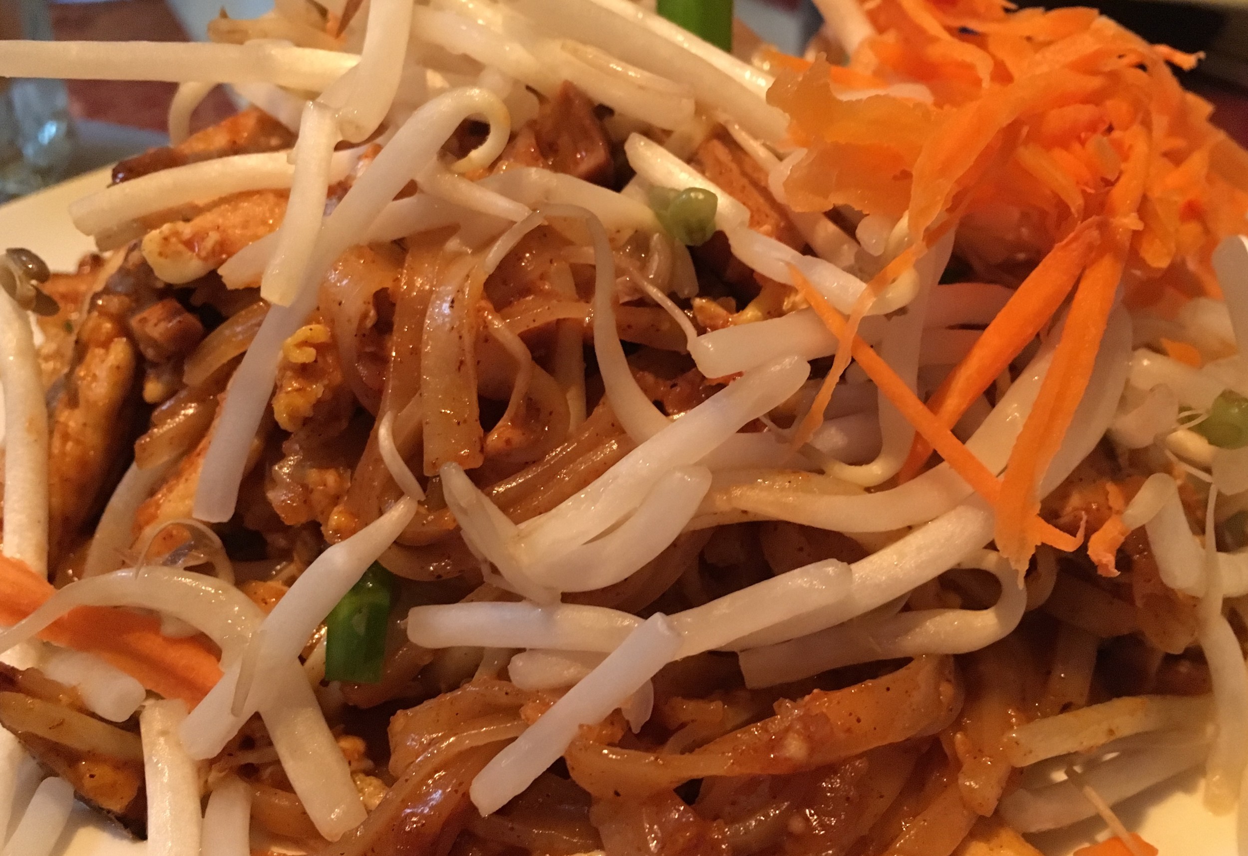 Pad Thai features a signature brown sauce made with classic Thai ingredients.