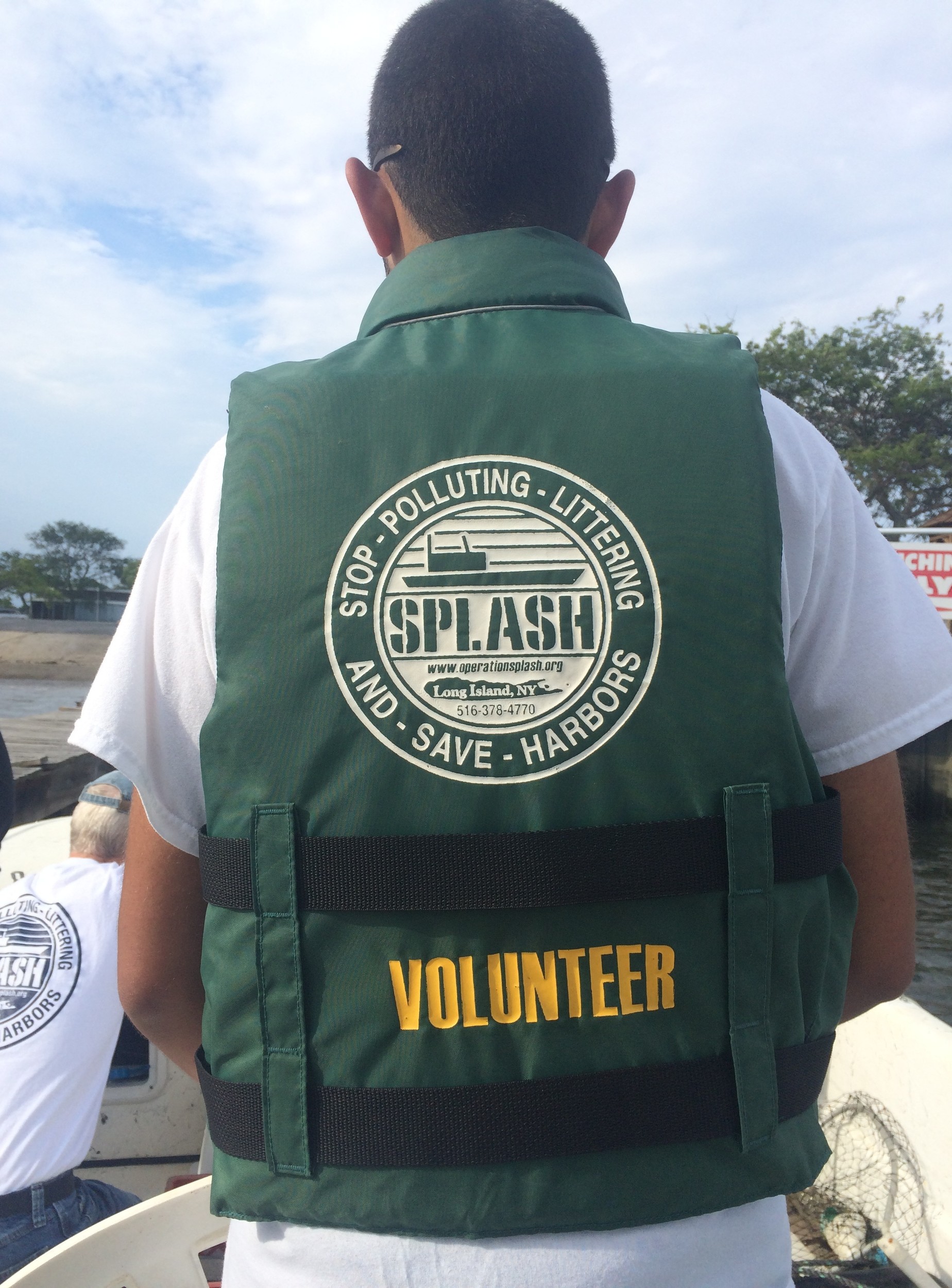 Volunteers for Operation SPLASH come from all over to help clean up the bays.