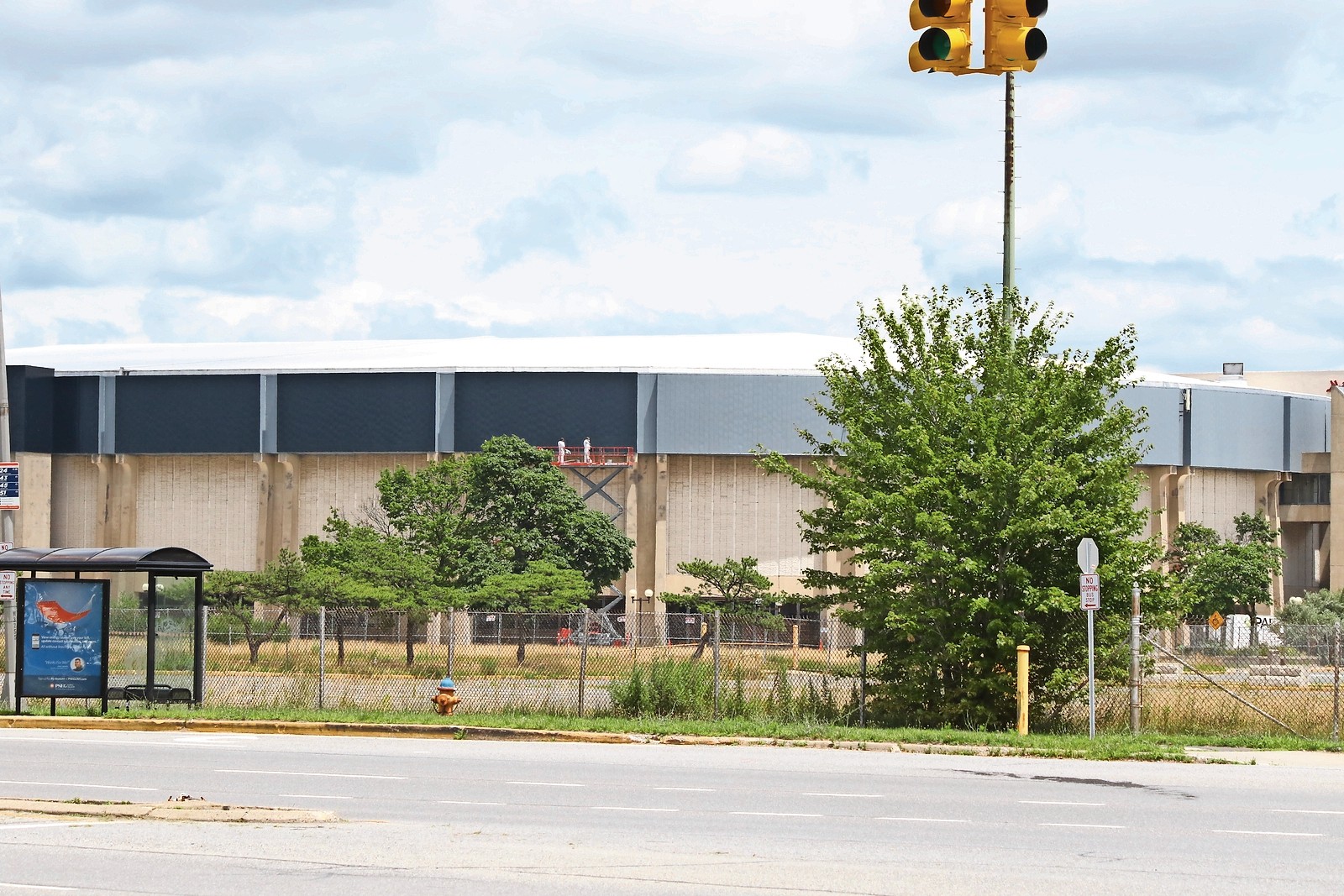 Crews started painting the Coliseum a earlier this month, after preparatory work for the exterior renovation of the Uniondale arena began on June 16.