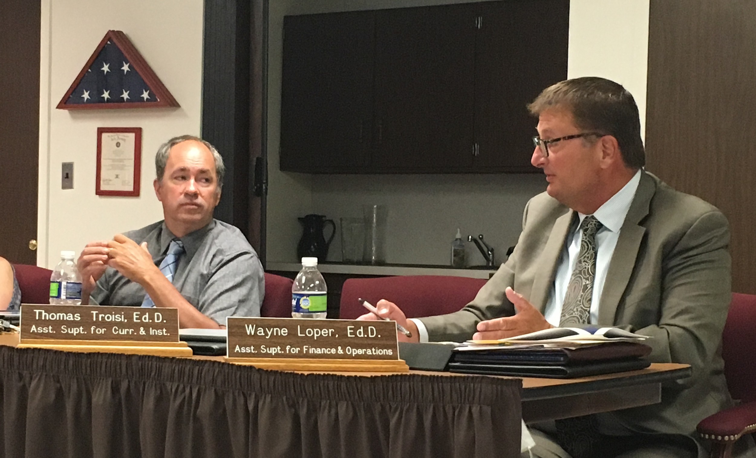 Wayne Loper, assistant superintendent for finance and operations, spoke about the district's necessary facilities upgrades, and how to fund them, at the July 12 Board of Education meeting.