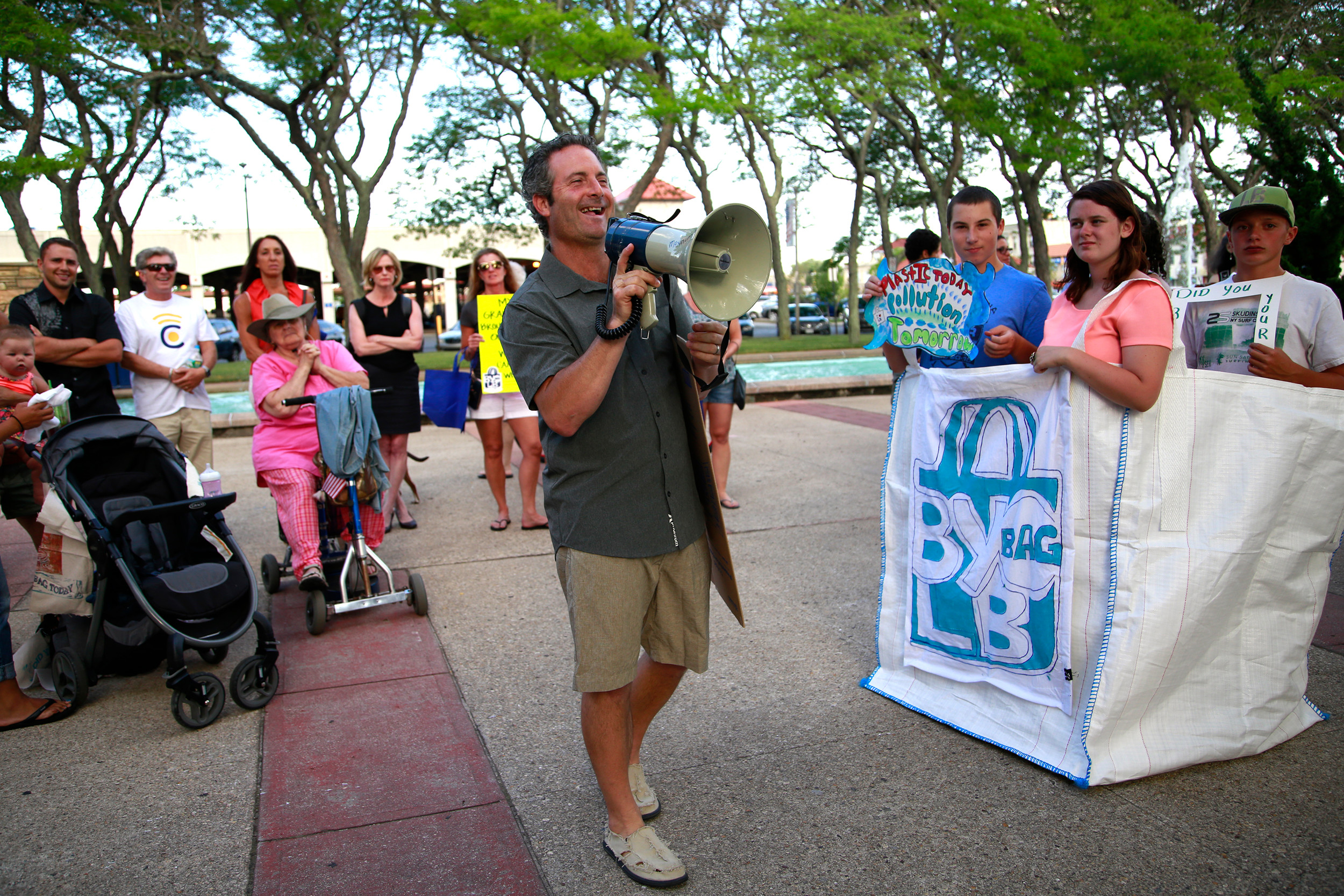 George Povall, of All Our Energy, led the rally, which called for a city ban of single-use plastic bags.