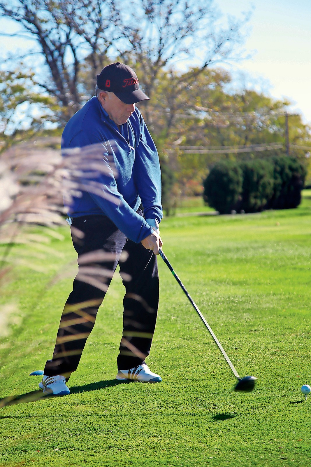 Lawrence team member Randy Green teed off at the first hole of the Long Island Village men’s golf championship at the Lawrence Yacht & Country Club.