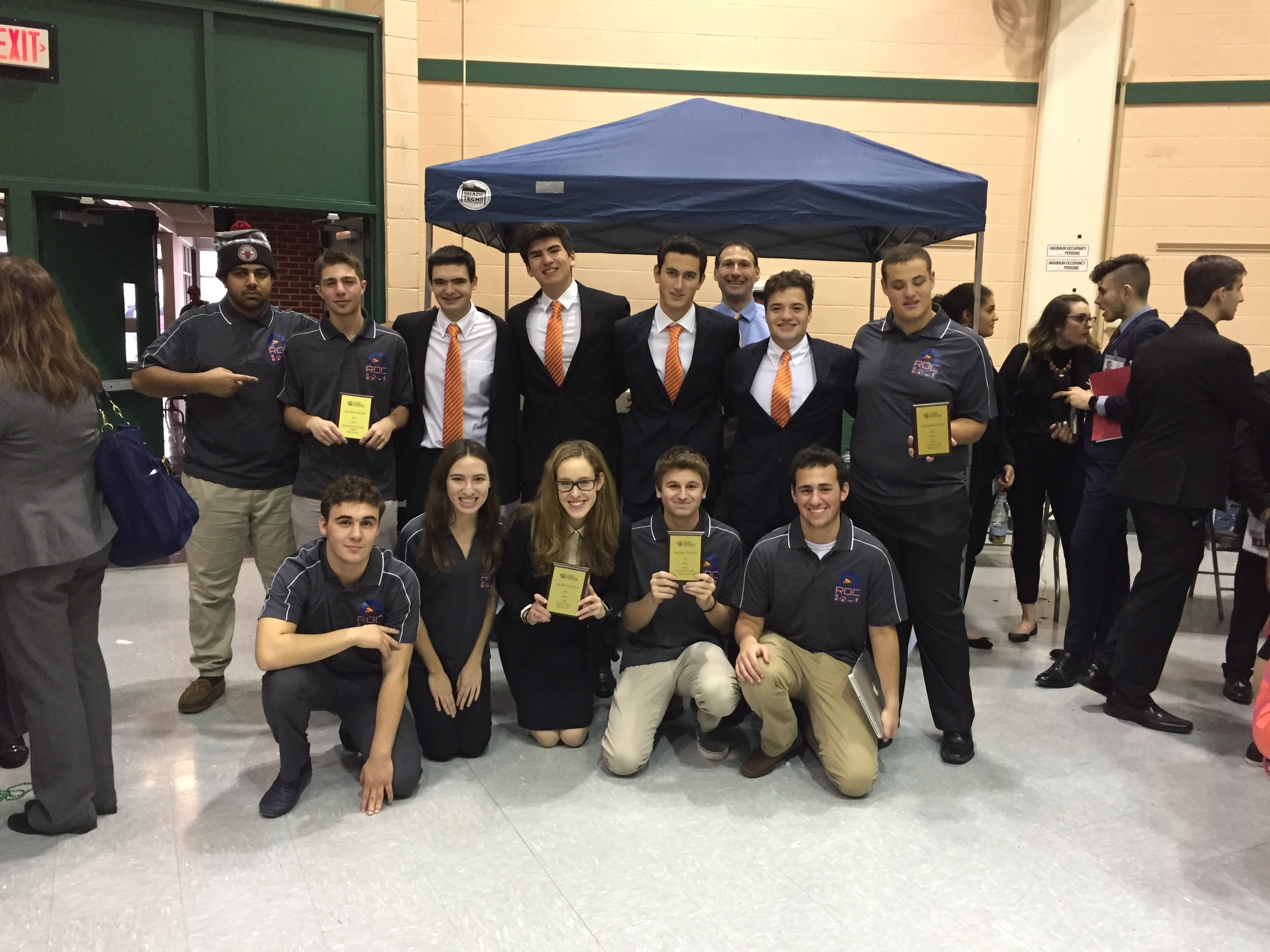 Hewlett High School seniors in the virtual enterprise program took home several awards at the Long Island Trade Show for their firm, ROC Security.