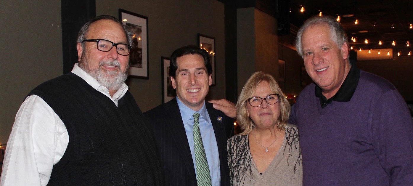 RVC Blue Speaks Founders Mary Lou Cancellieri, third from left, and husband Tony Cancellieri, right, raised $5,000 for autism research during a fundraiser at Monaghan’s Restaurant on Jan. 18. Rockville Centre Mayor Francis X. Murray, left, and State Senator Todd Kaminsky, second from left, attended the festivities.
