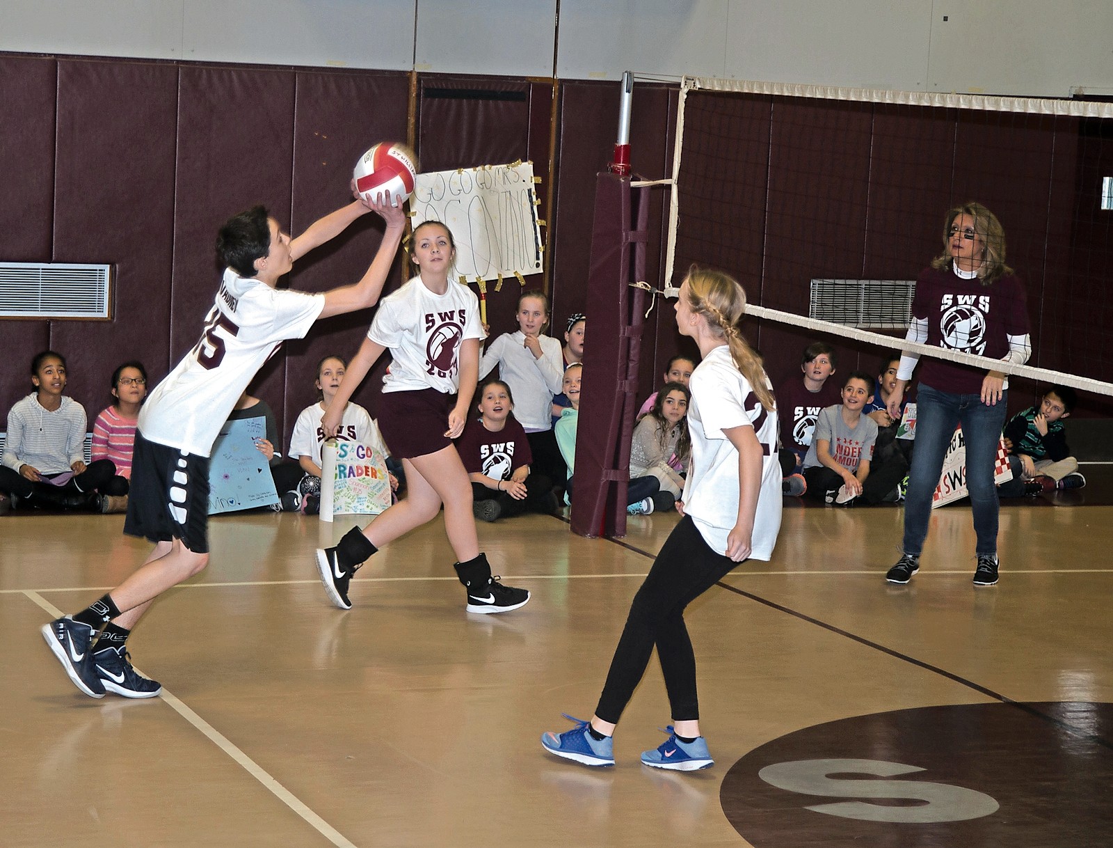 For the first time, students and teachers competed in a friendly volleyball game during Catholic Schools Week.
