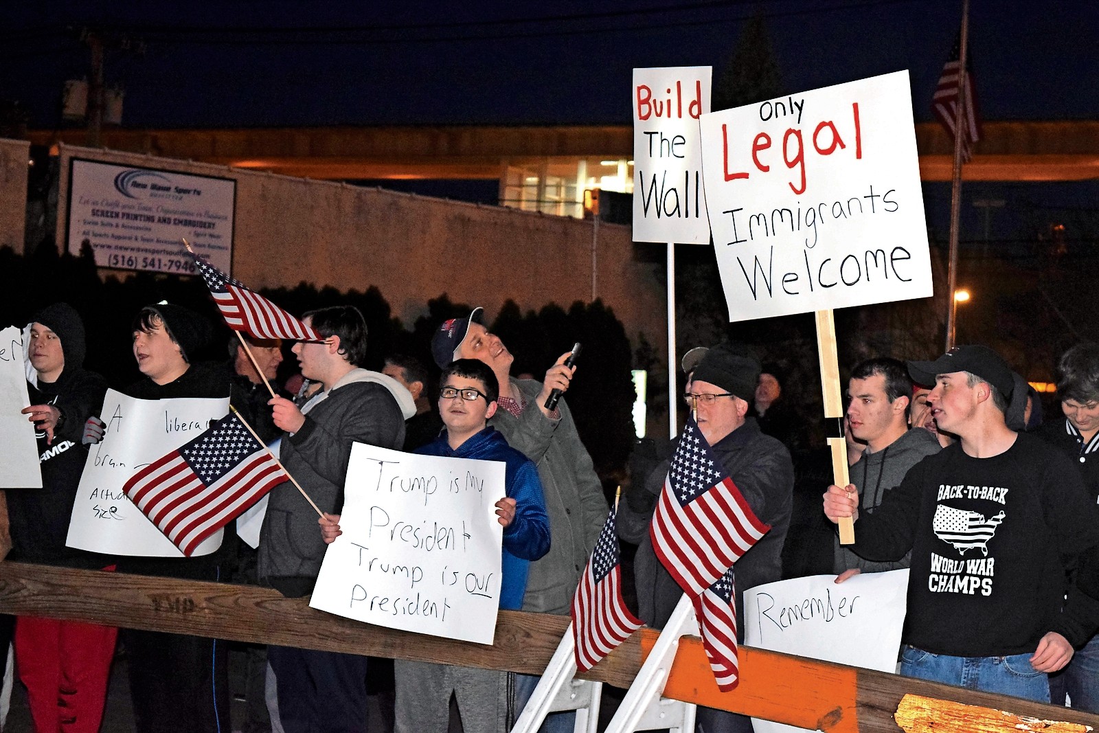 Supporters of the immigration order and President Trump also gathered outside of King’s office.
