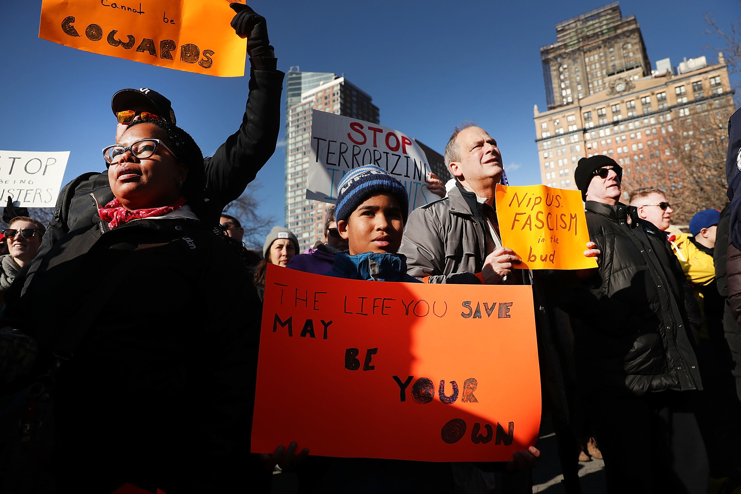 Photographer Spencer Platt captured this image of Point Lookout resident Chris Connolly, far left, with his wife, Joy, and son, Oliver, at a protest in Battery Park on Jan. 29. The image was used by major news media organizations such as The New York Times.