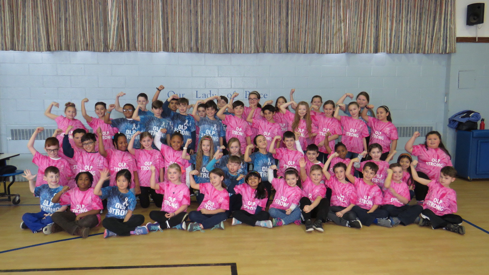 At Our Lady of Peace in Lynbrook, the students wore “OLP Strong” shirts to inspire unity.