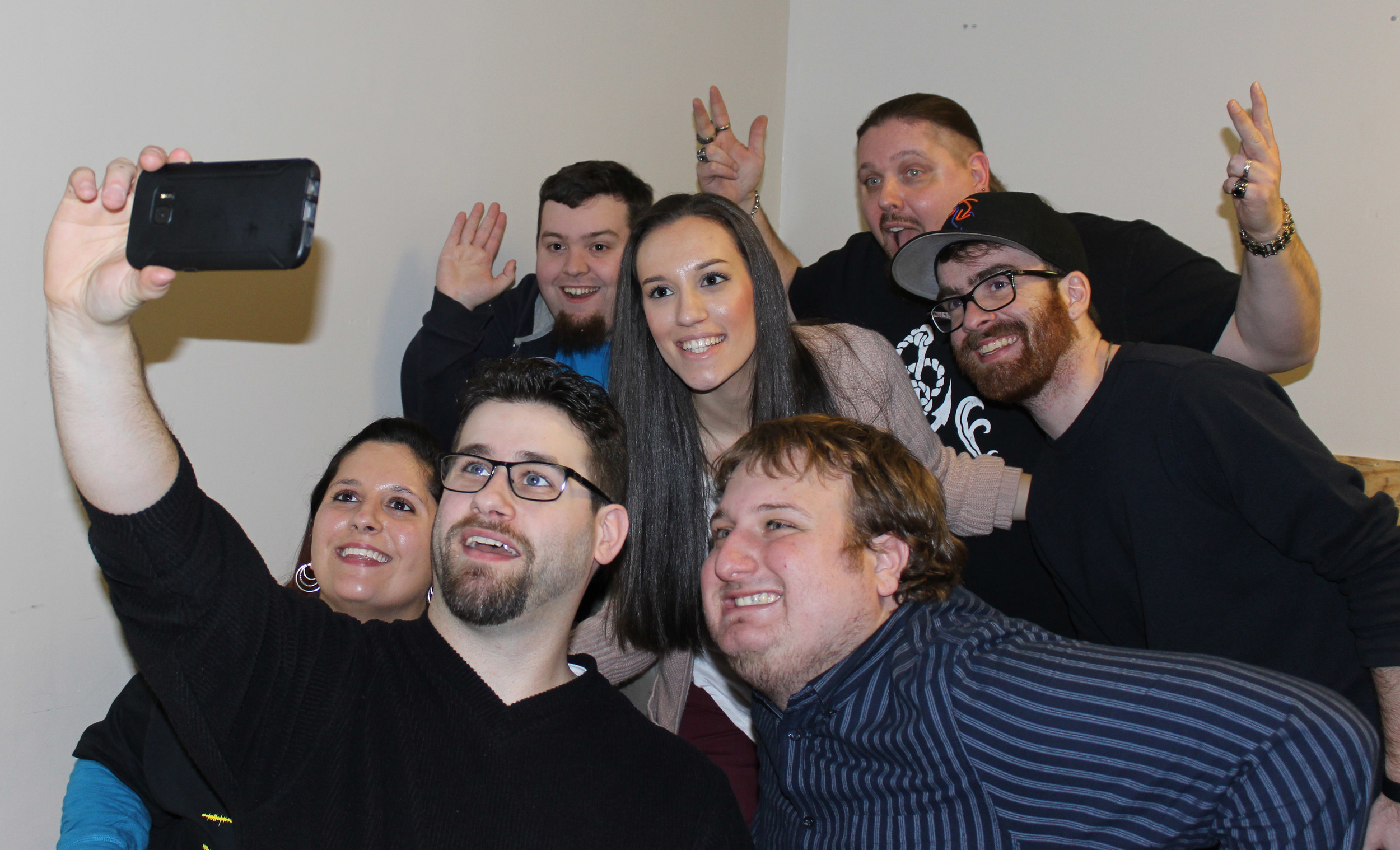 Grindhouse Radio cast members and friends, posing for a group selfie, included Jenna Leonardi, far left; co-host Stephen Zambito, 25, of Stony Brook; Kevin Dempsey, 26, of Bay Shore; co-host Kim Adragna, 22, of Merrick; Steve Eisenberg; co-host William Kucmierowski, 42, of Levittown; and Tom Greer, of West Babylon.