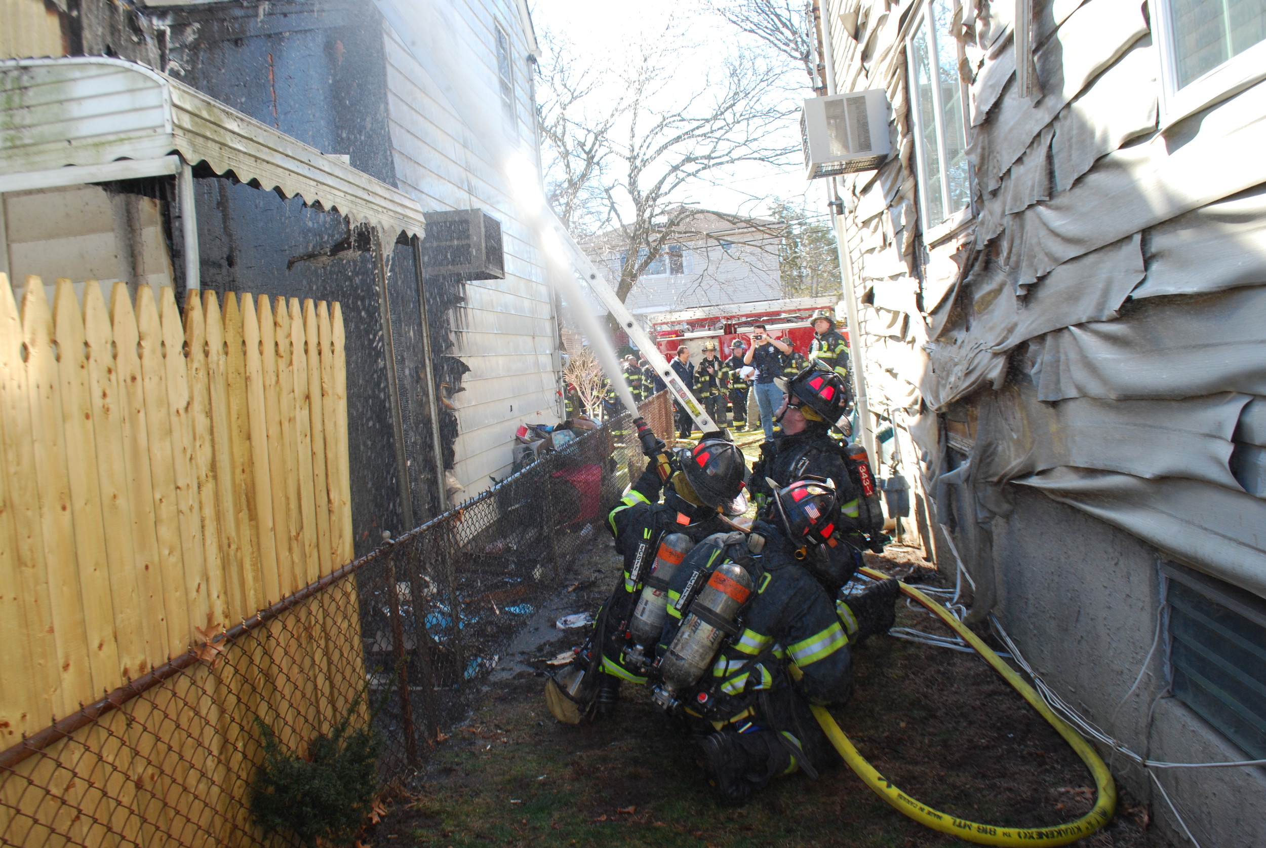 The top floor of the house was engulfed in flames at about 11 a.m. on Feb. 20.
