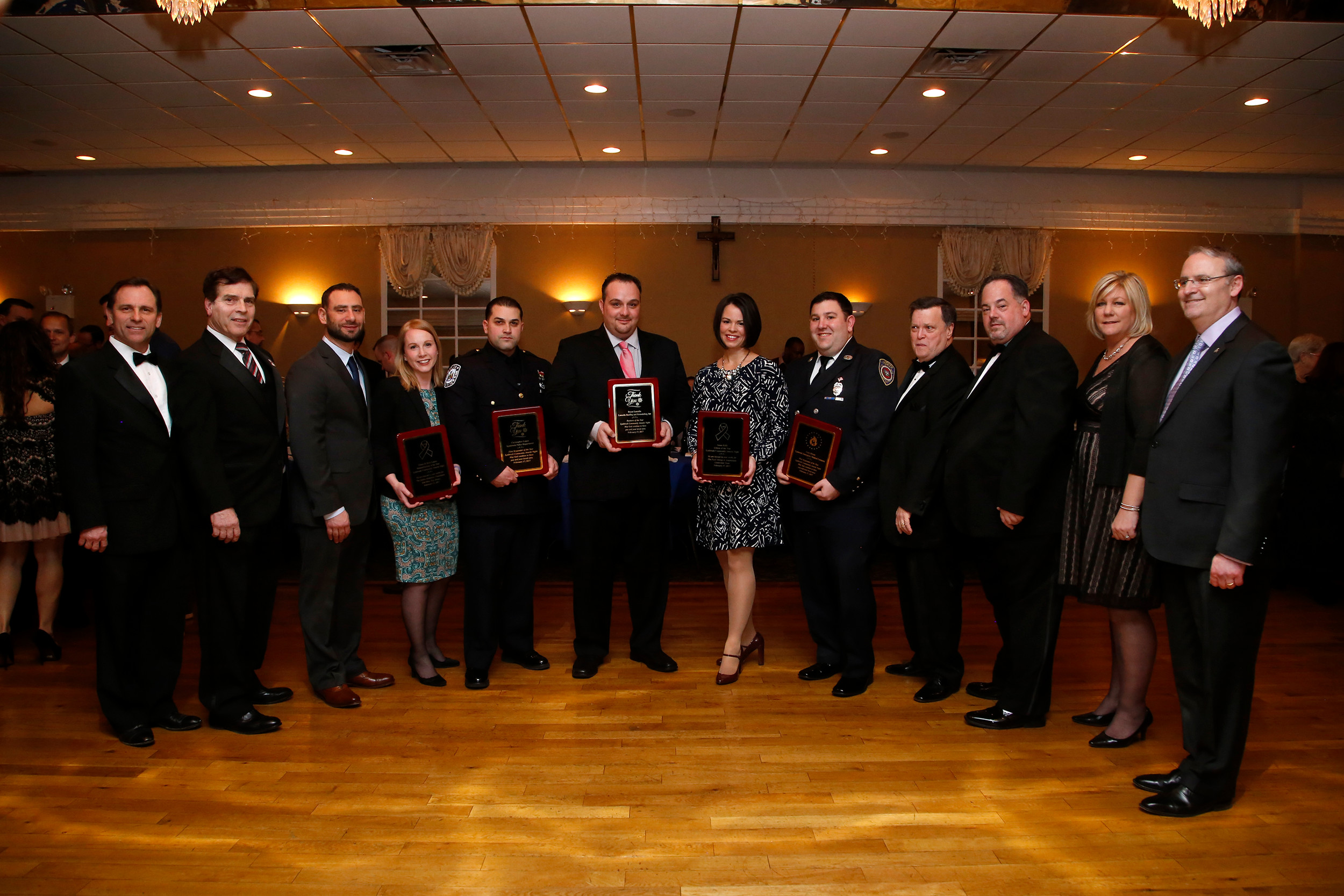 Brett and Eileen Linzer, third and fourth from left, were among the award recipients. They were honored with the Humanitarians of the Year Award.