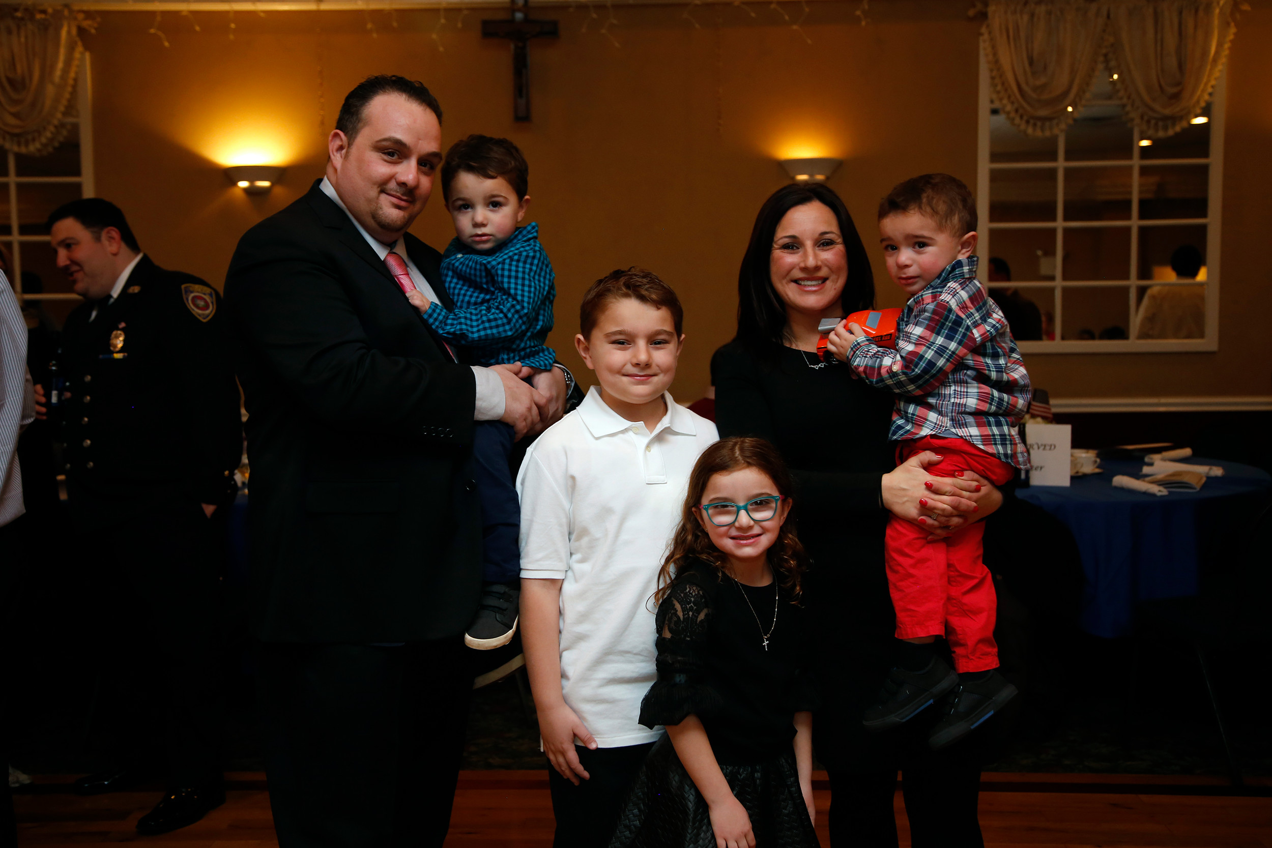 Bryan Lanzello, left, celebrated with his family after his company, Lanzello Roofing and Remodeling, Inc., was named Business of the Year at Lynbrook Mayor Bill Hendrick’s annual awards ceremony at the Saint Mary’s Knights of Columbus on Feb. 17.