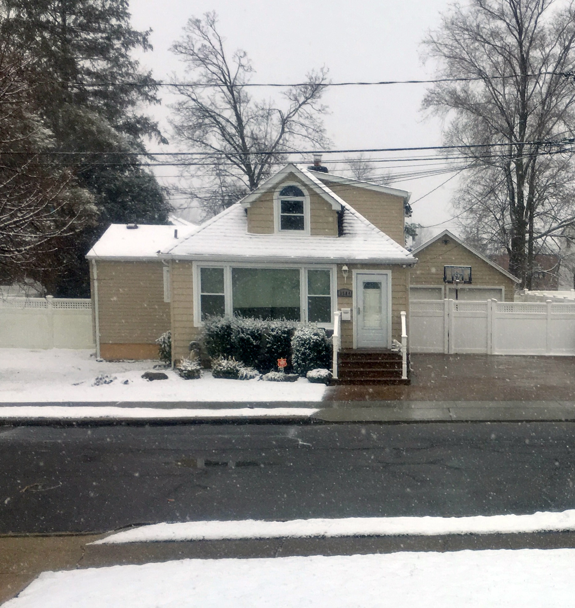 Snow blanketed homes in Seaford by 8 a.m.