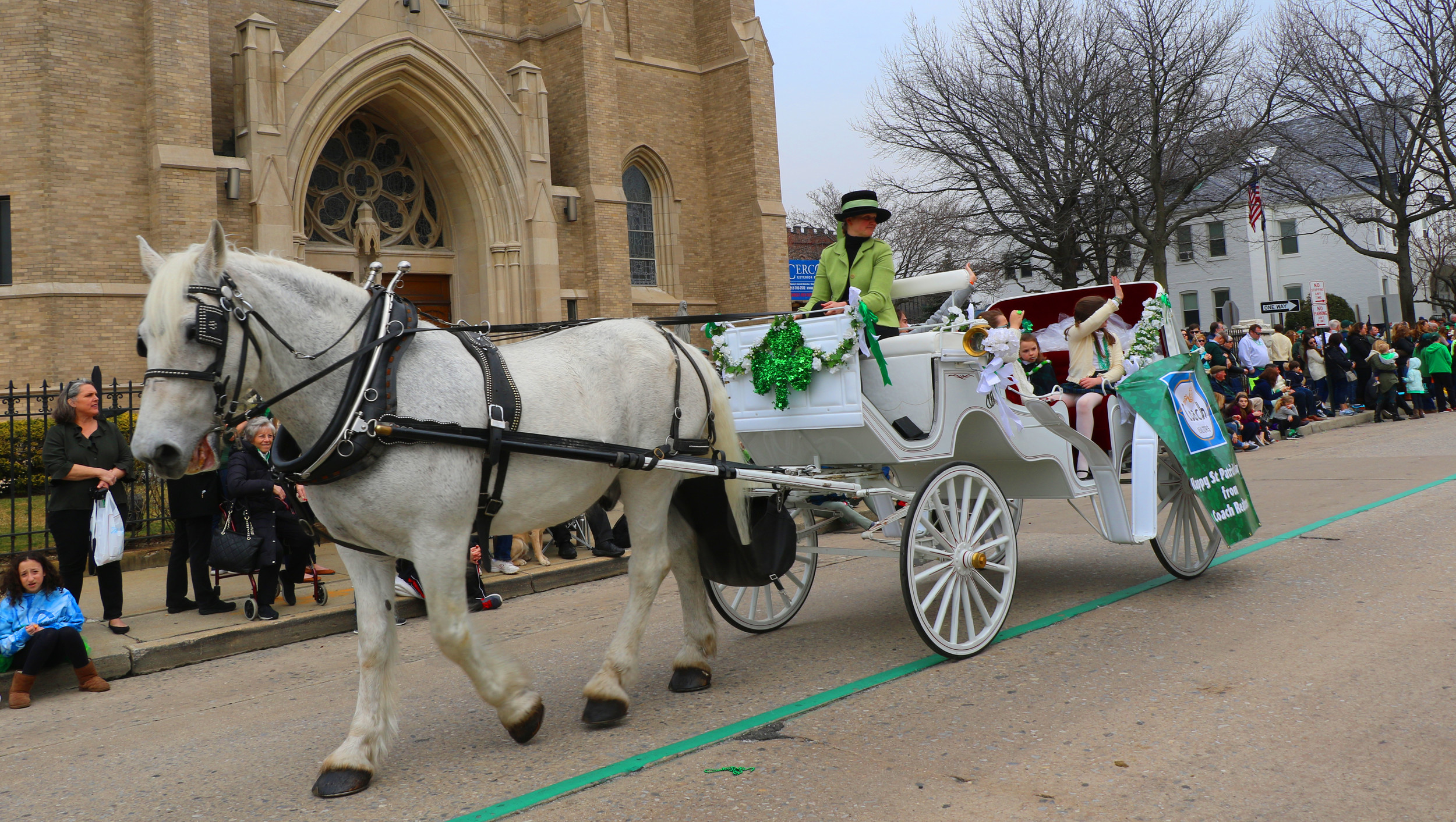 Coach Realtors marched with a horse and carriage on Saturday.