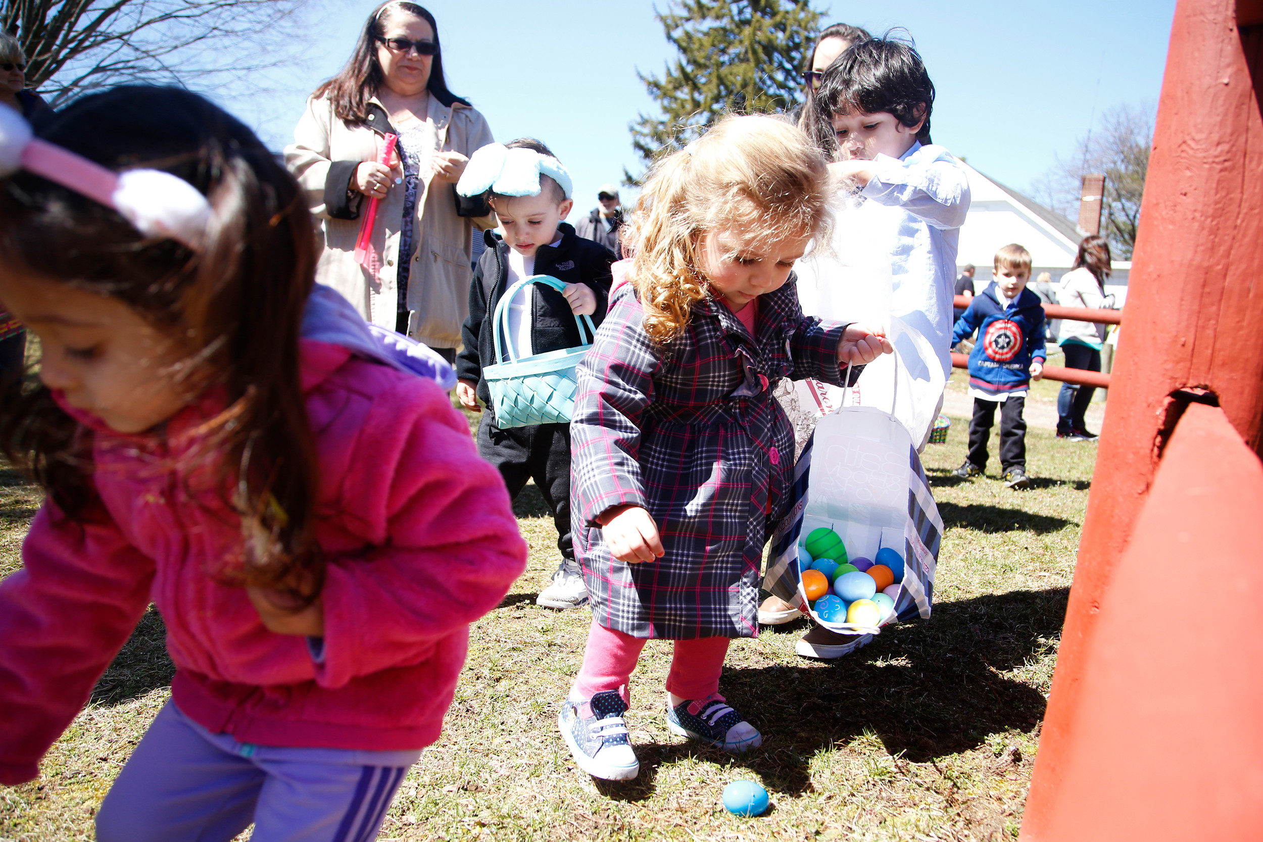 Morgan Zizzo, 2, found a blue egg for her basket.
