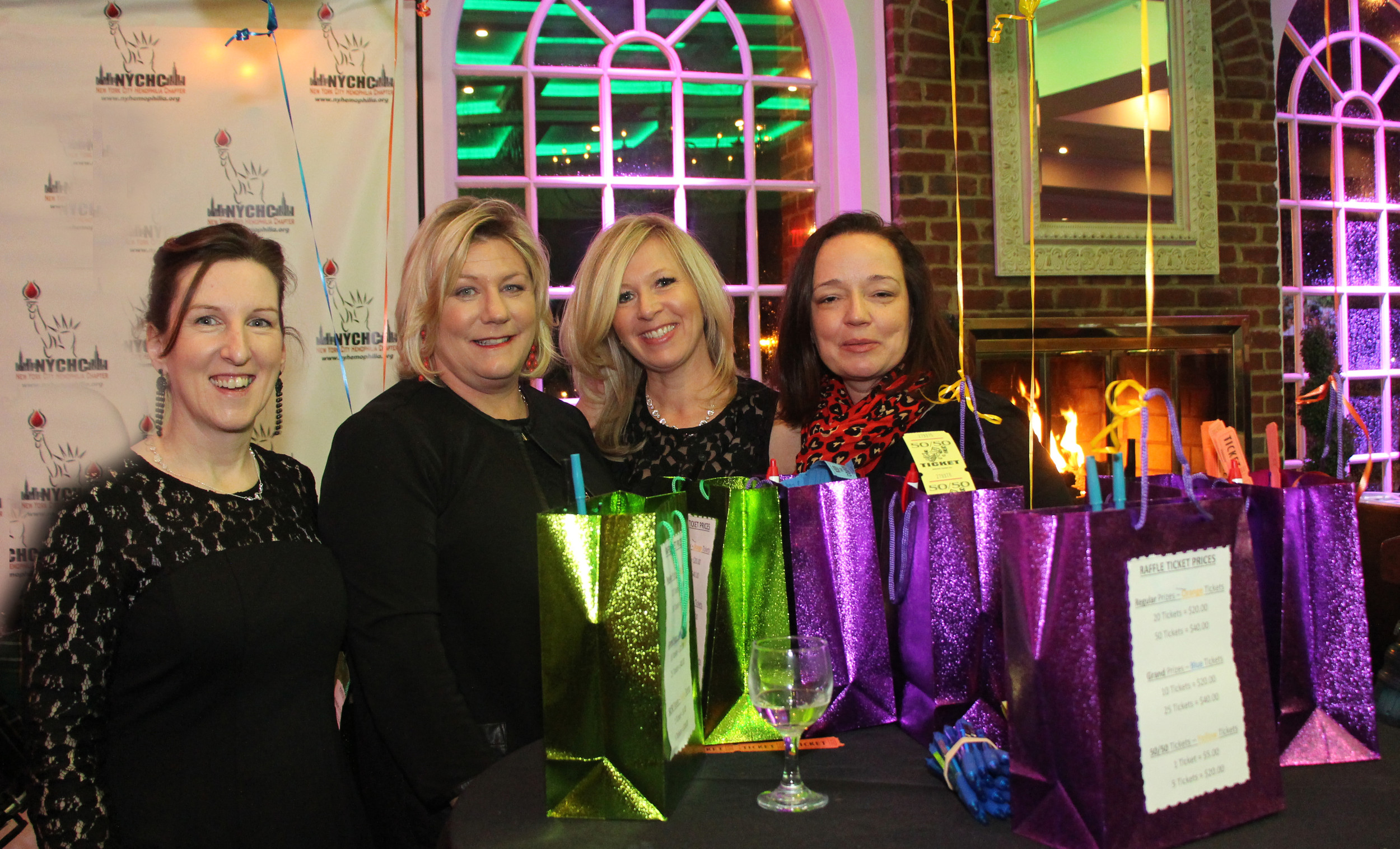 Anne Hughes, left, Anne Marie Reardon, Jenny Atkinson and Colleen Harris handed out raffles at the event.