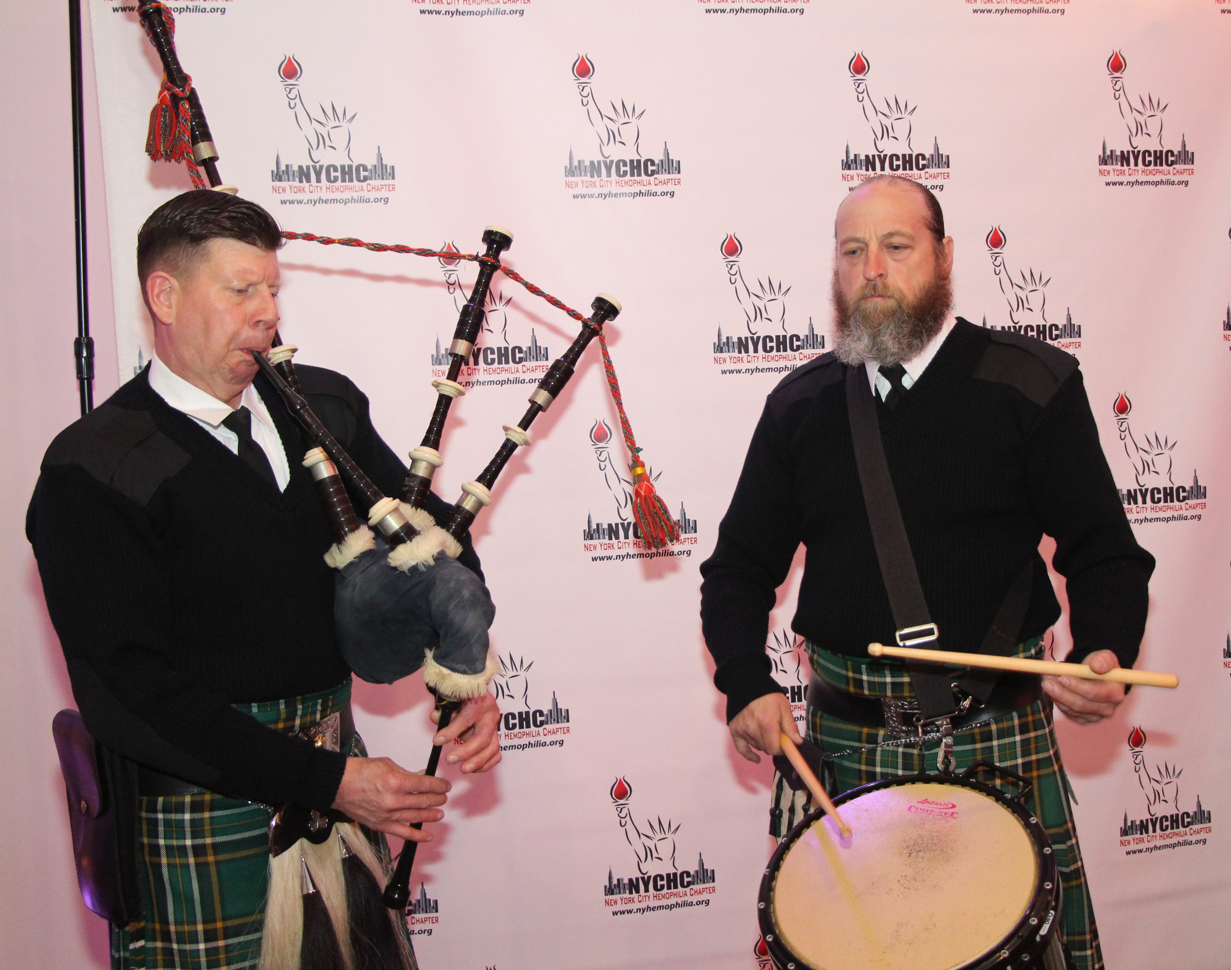 Peter Ledwith, left, and Kevin McTigue provided music for the event with bagpipes and drums.