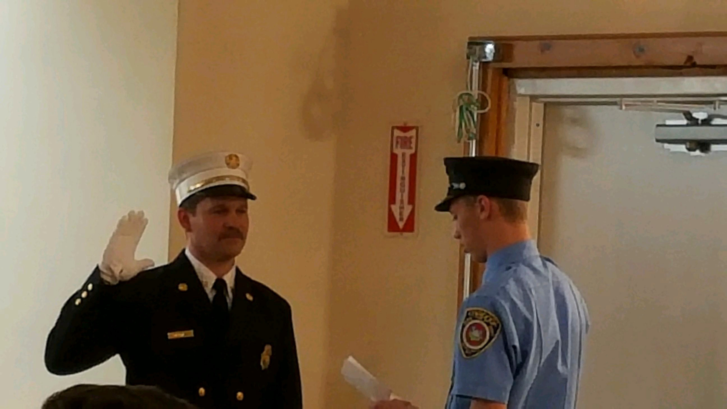 James Merkel swore in his father, Tom, as the new chief of the East Rockaway Fire Department on April 18. It marked the first time a chief was sworn in by his son.
