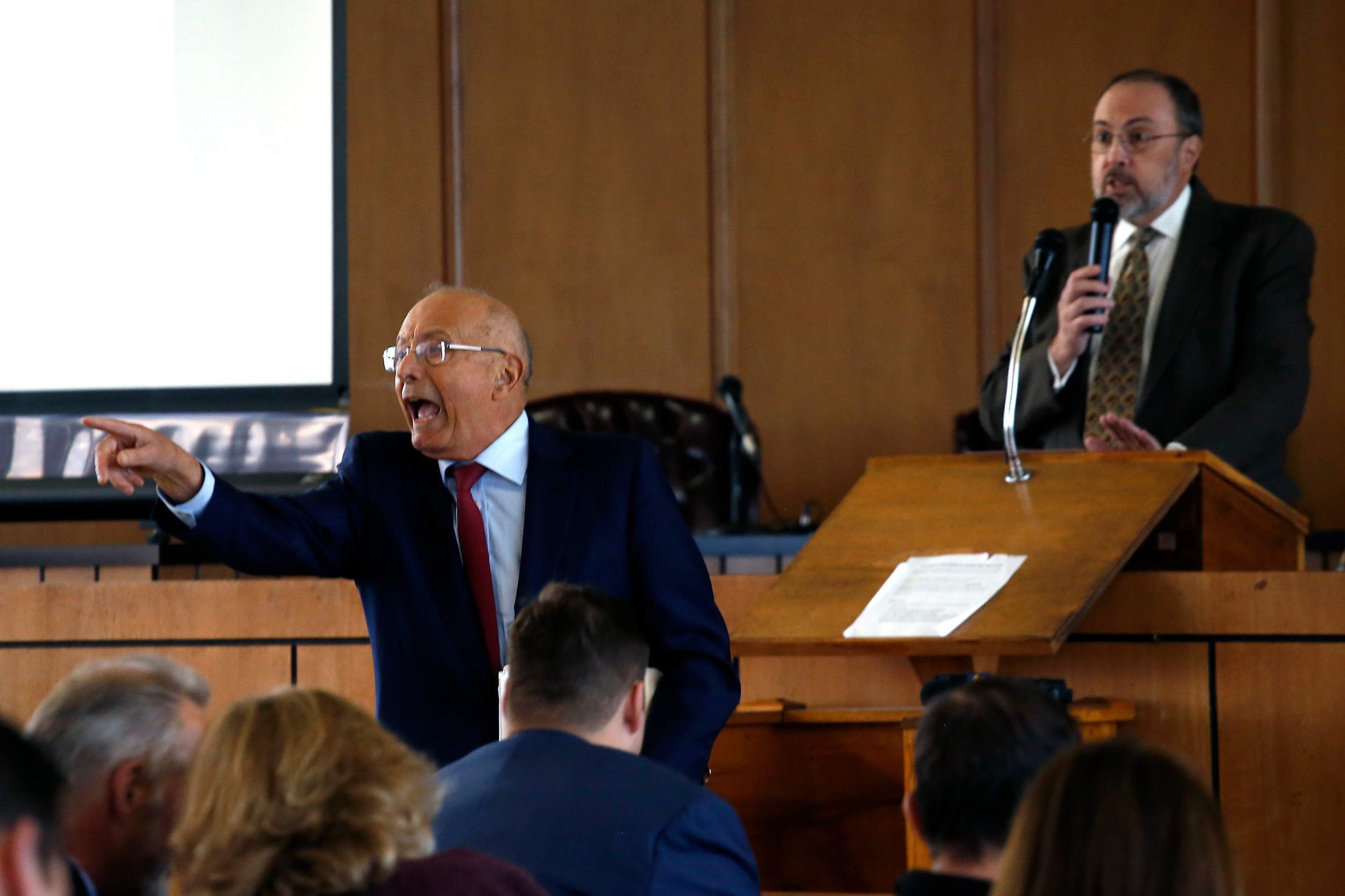Former U.S. Sen. Al D’Amato stormed out of City Hall on Tuesday after residents were told that questions would only be taken on index cards at a public meeting the city held to update residents about iStar's latest request for tax breaks and potential litigation against the city.