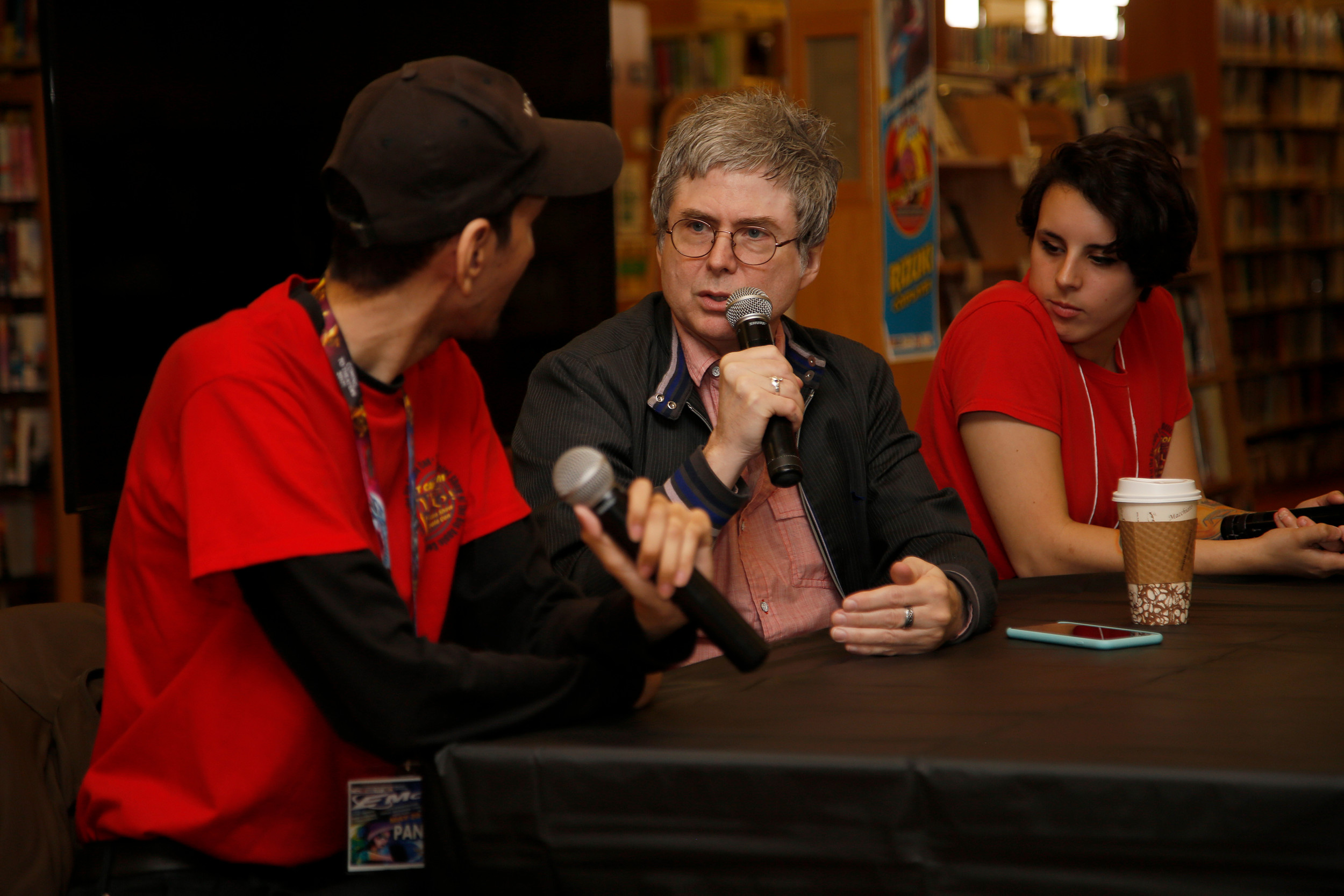Voice actor Quinton Flynn, center, answered questions from audience member during a panel session hosted at the East Meadow Public Library, as part of the library’s 7th annual EMCon Animefest.