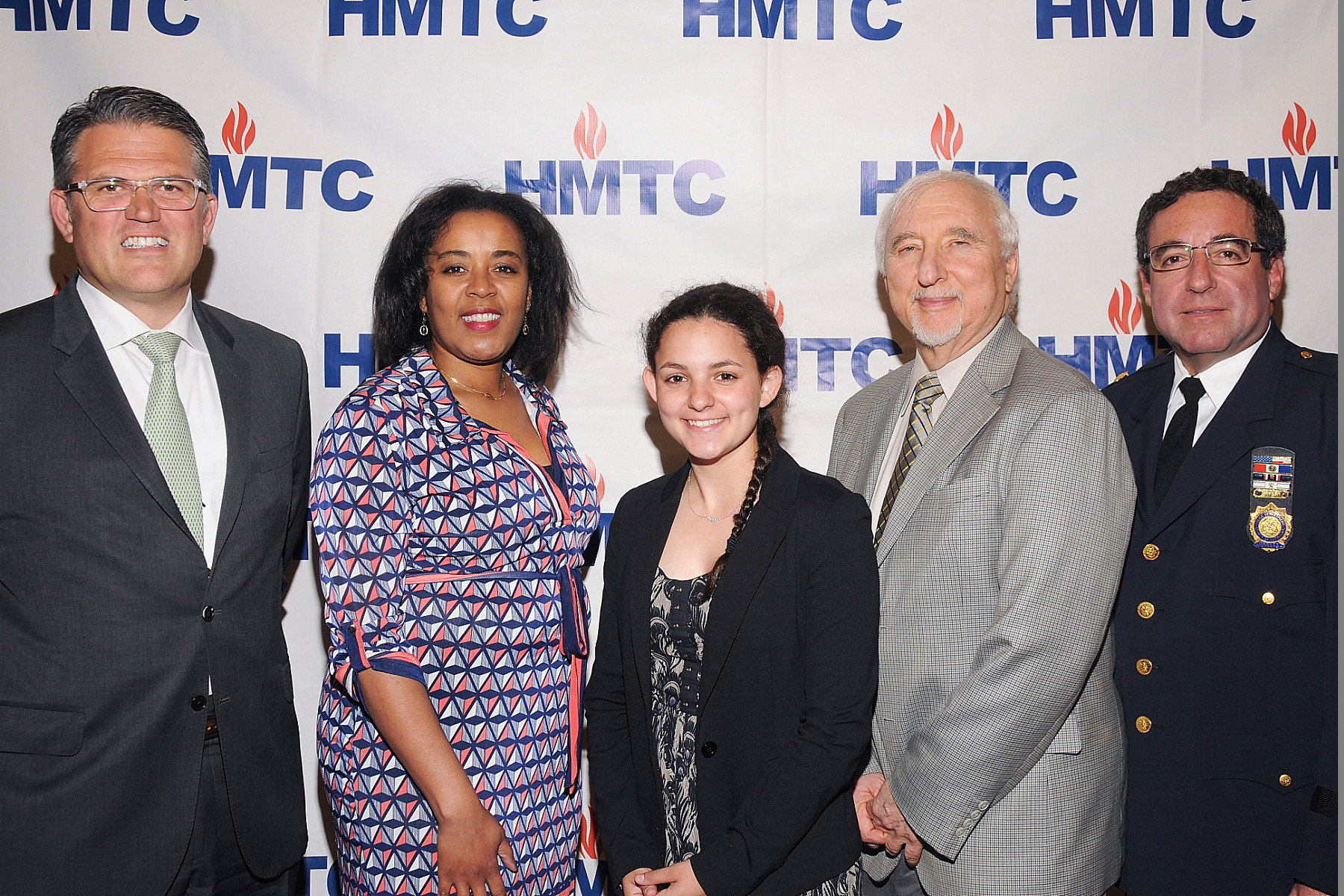 Hewlett High sophomore Sophie Riegel won an Upstander Award from the Holocaust Memorial & Tolerance Center of Nassau County. From left were Peter Klein, Claire Friedlander Family Foundation, Tracy Garrison-Feinberg, director of the Claire Friedlander Education Institute; Riegel, Steven Markowitz, chairman of the HTMC; and NCPD Deputy Inspector Alan Hirsch.