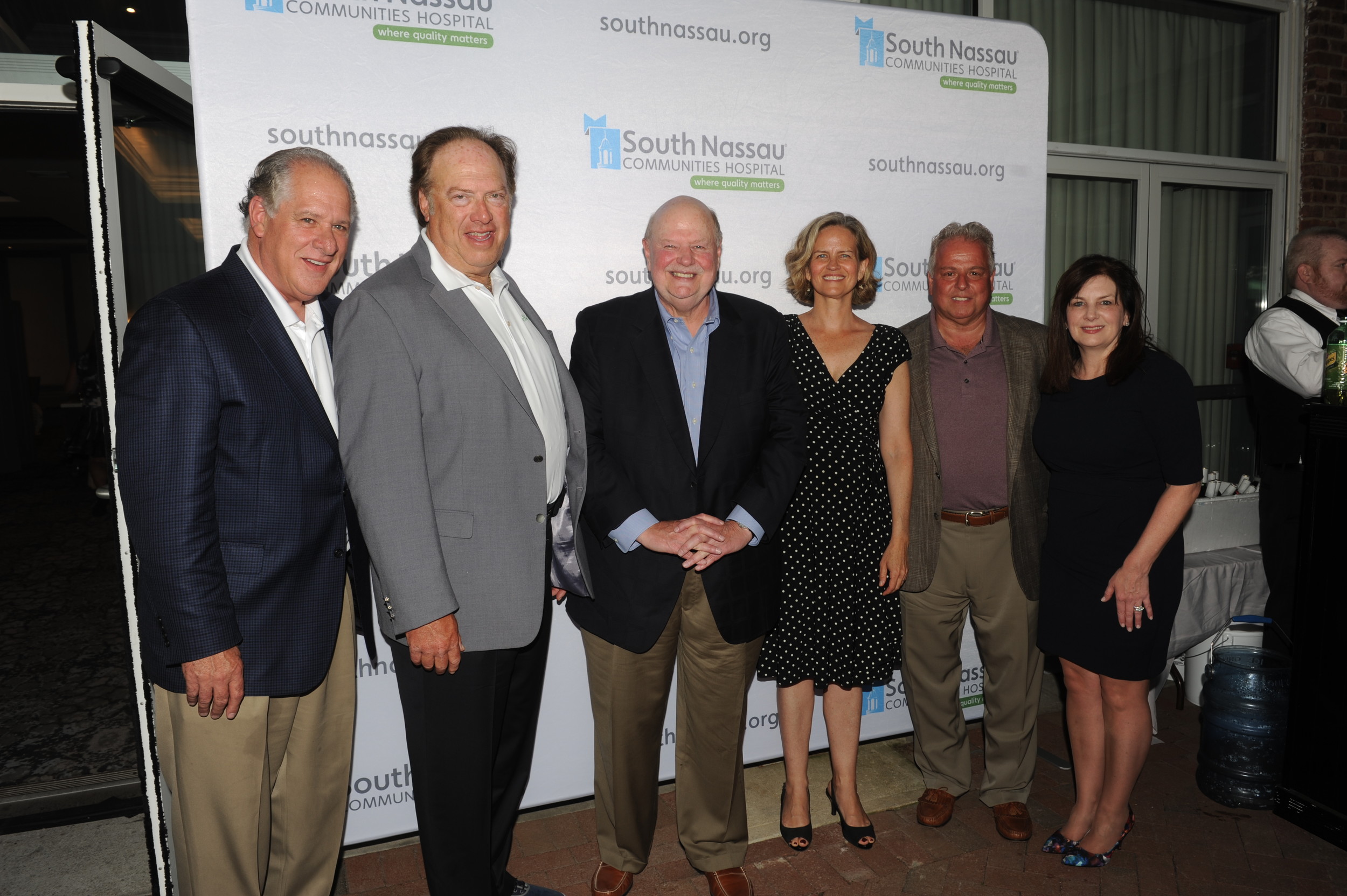 Golf Committee co-chairmen Tony Cancellieri and Jeff Greenfield, left, Chairman of the Board Joseph Fennessy, Legislator Laura Curran and Michael and Eileen Sapraicone.