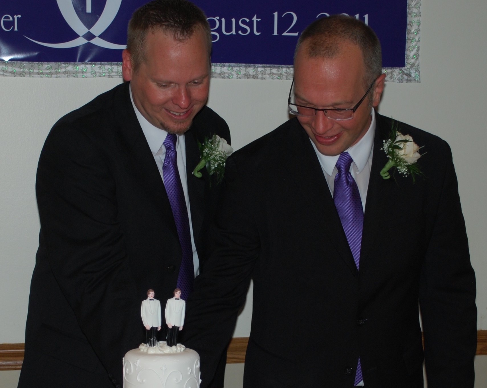 The Rev. Christopher Hofer, left, married Kerry Brady in August 2011 at the Church of St. Jude in Wantagh.