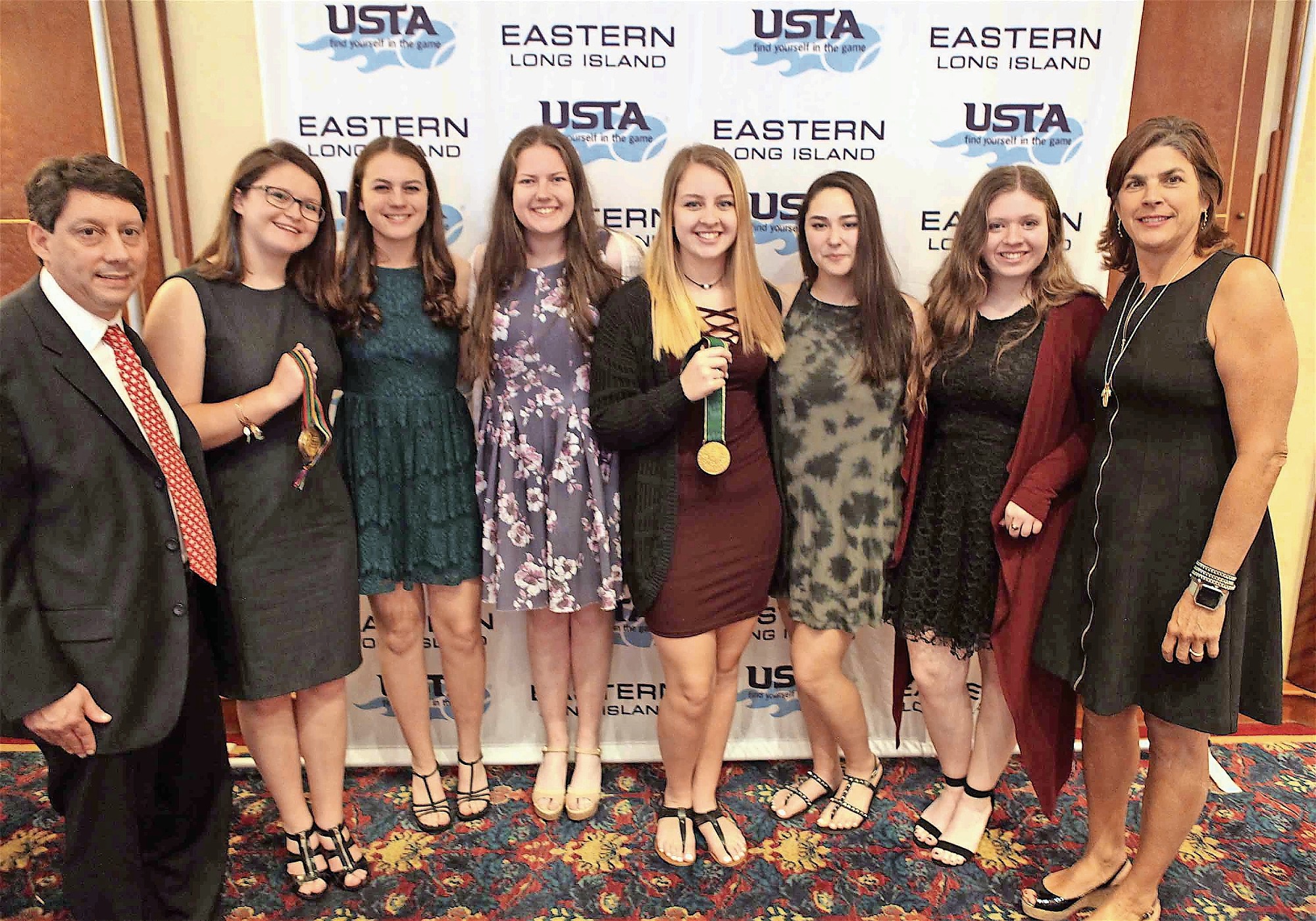 The MacArthur girls’ tennis squad was named the High School Team of the Year at the U.S. Tennis Association Long Island Region Awards. Members of the team met with USTA Long Island President Jonathan Klee, far left, and International Tennis Hall of Fame member Gigi Fernandez, right, at the May 3 ceremony.