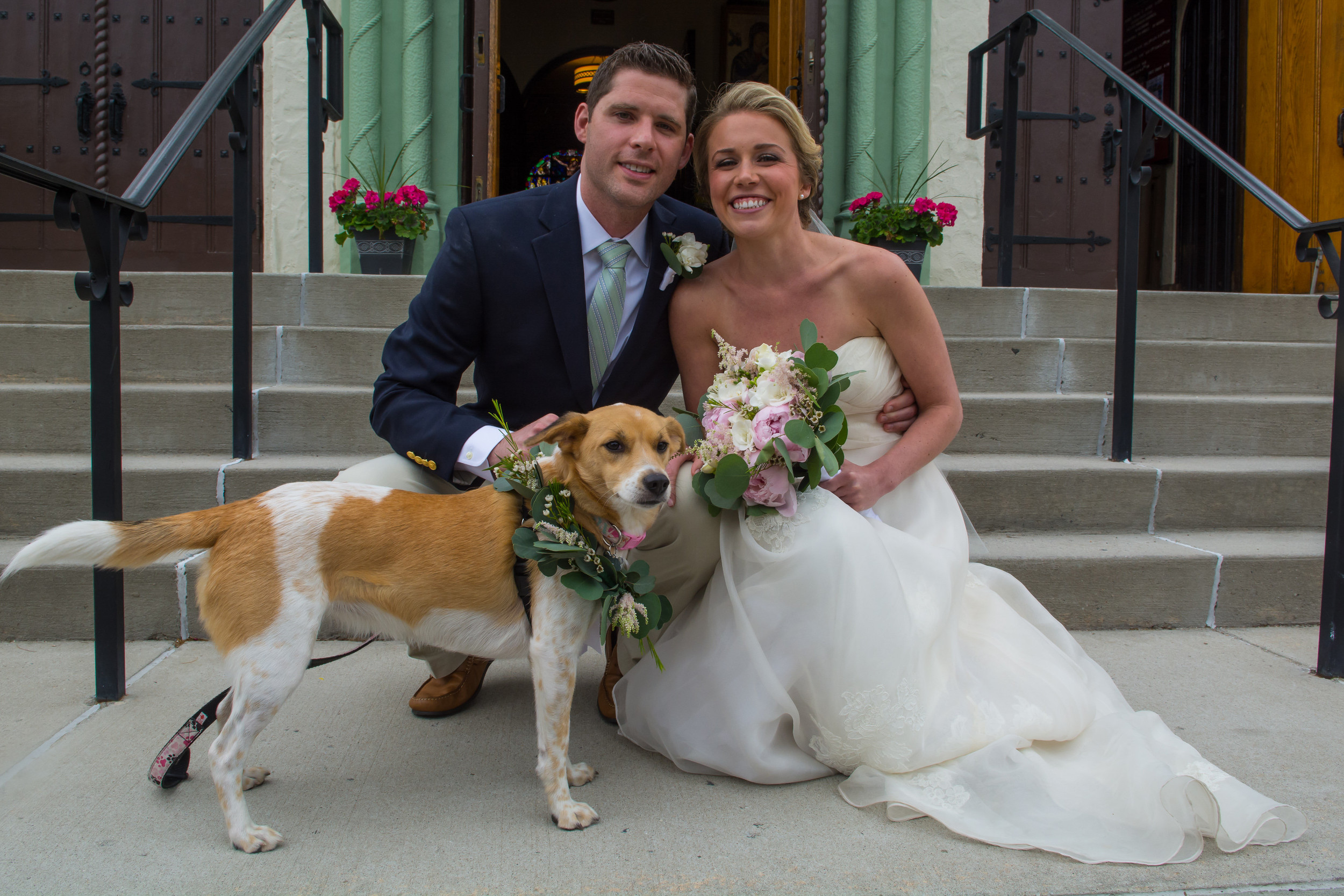 Caroline and Paul Carroll, above, with Lilly outside Our Lady of Lourdes in Malverne on their wedding day.