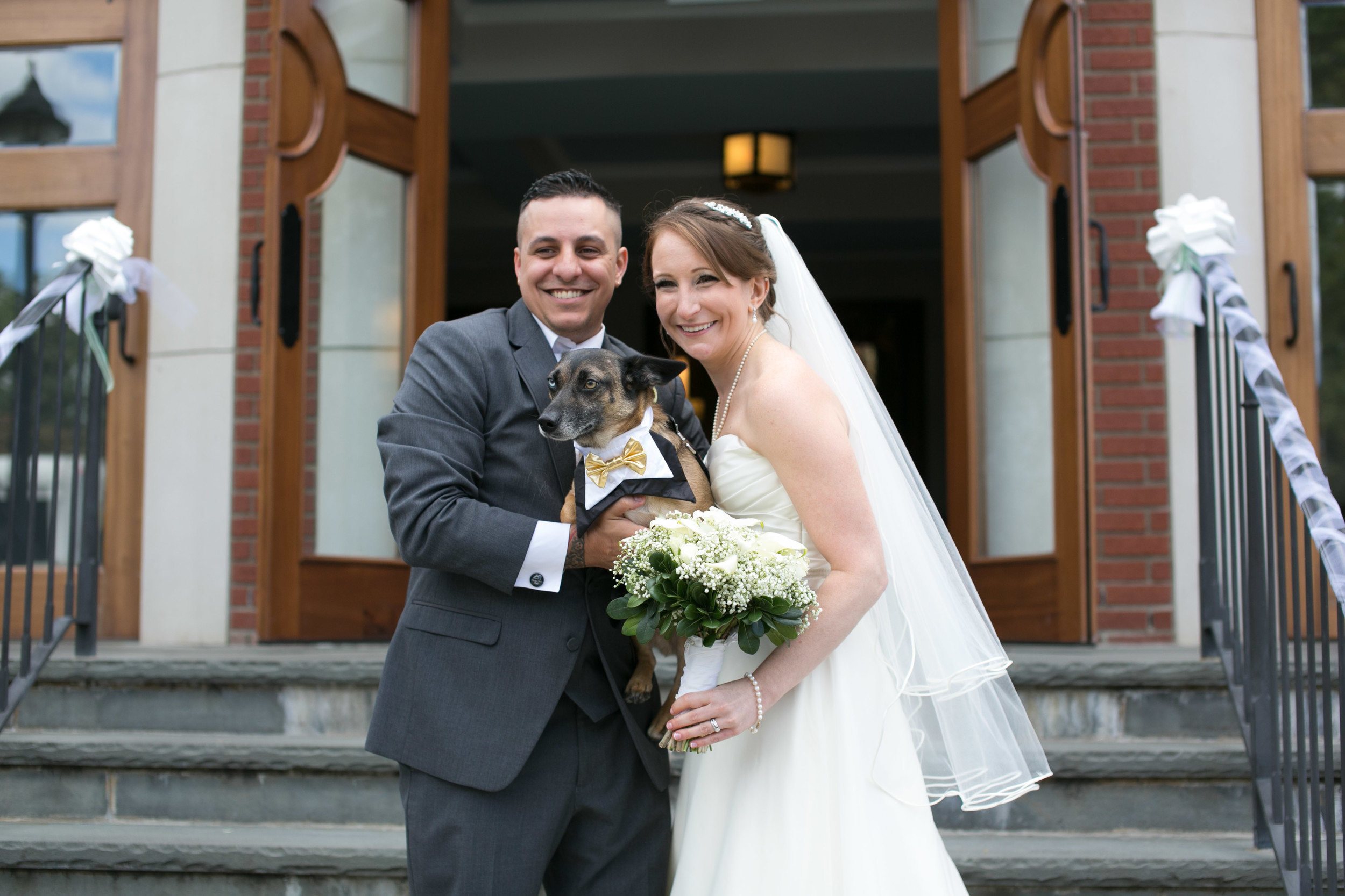 The Silvas on their wedding day with their dog JakeBear. Veronica had the idea to start Pawfect For You after having difficulty managing care for her dog during her own wedding.