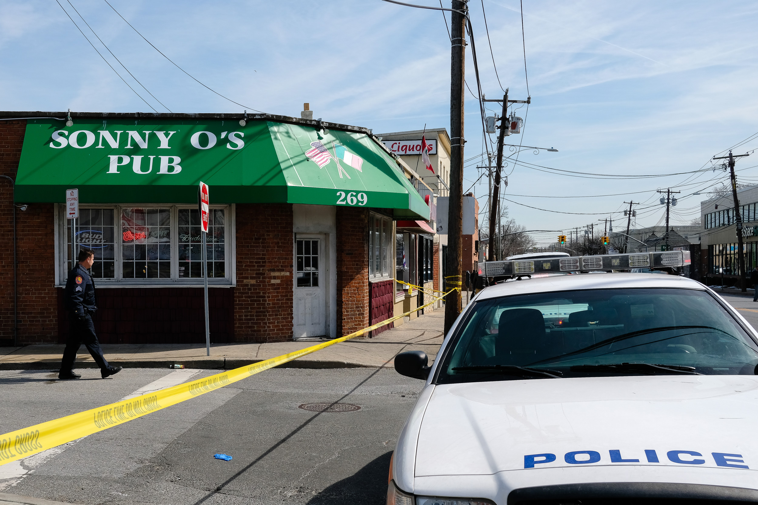 Nassau County police on the scene at Sonny O's Pub on March 13, where a man was shot and killed.