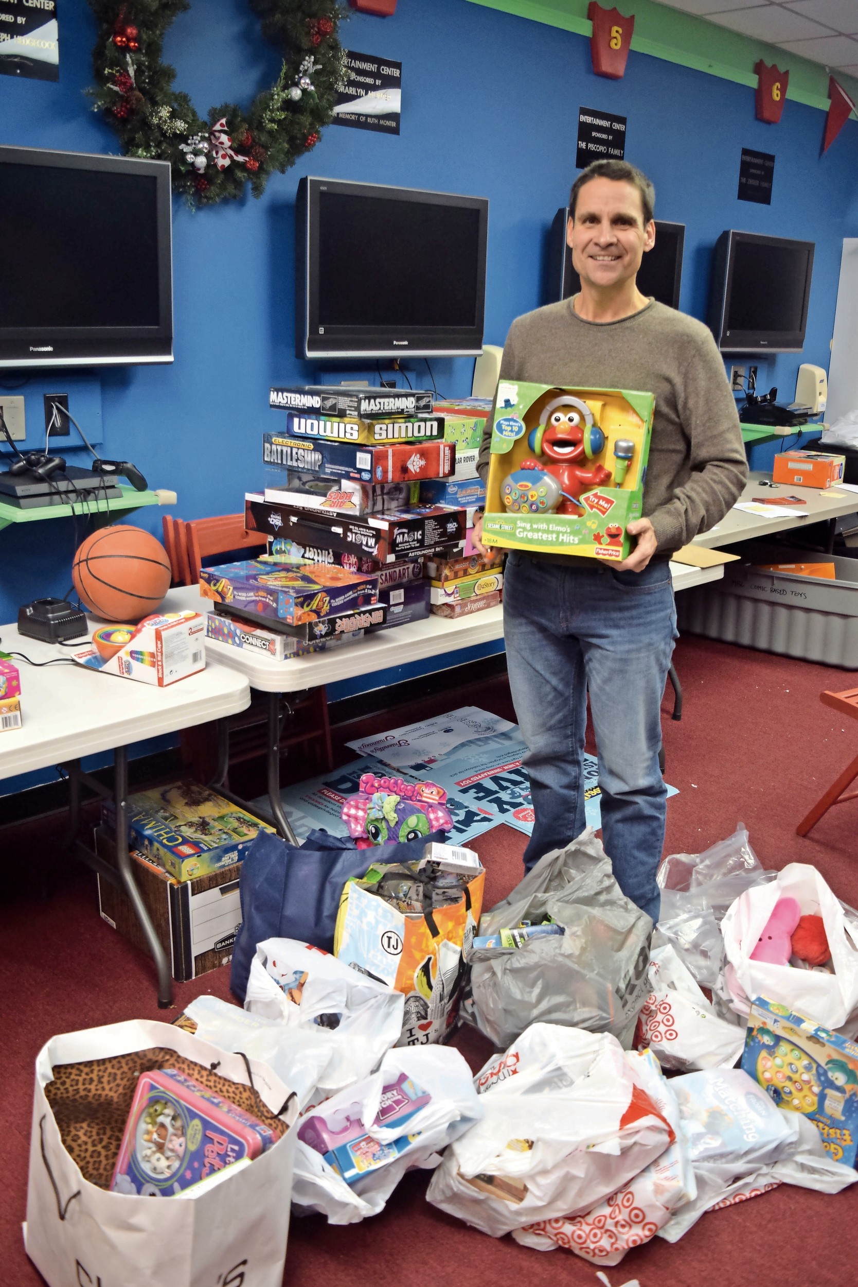 John Theissen said that the Wantagh center serves as home base for his charity’s annual back-to-school supply and holiday toy drives.