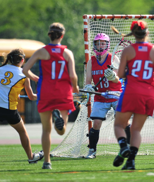 South Side High School goalie Kelsey Gregerson, No. 13, pictured in 2010, was the “backbone” of the Cyclones squad.
