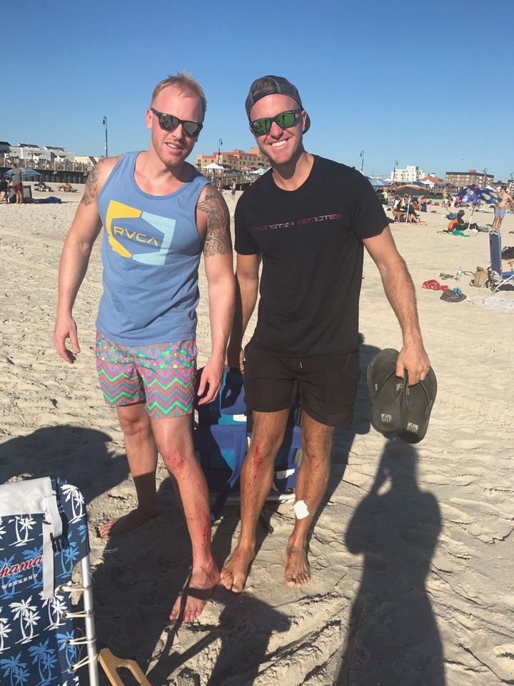 Rhame Avenue Principal Erik Walter, right, and his friend Gregory Dressel had scrapes on their legs and feet after they jumped into the water at Edwards Boulevard, in Long Beach, to rescue two girls who were drowning.