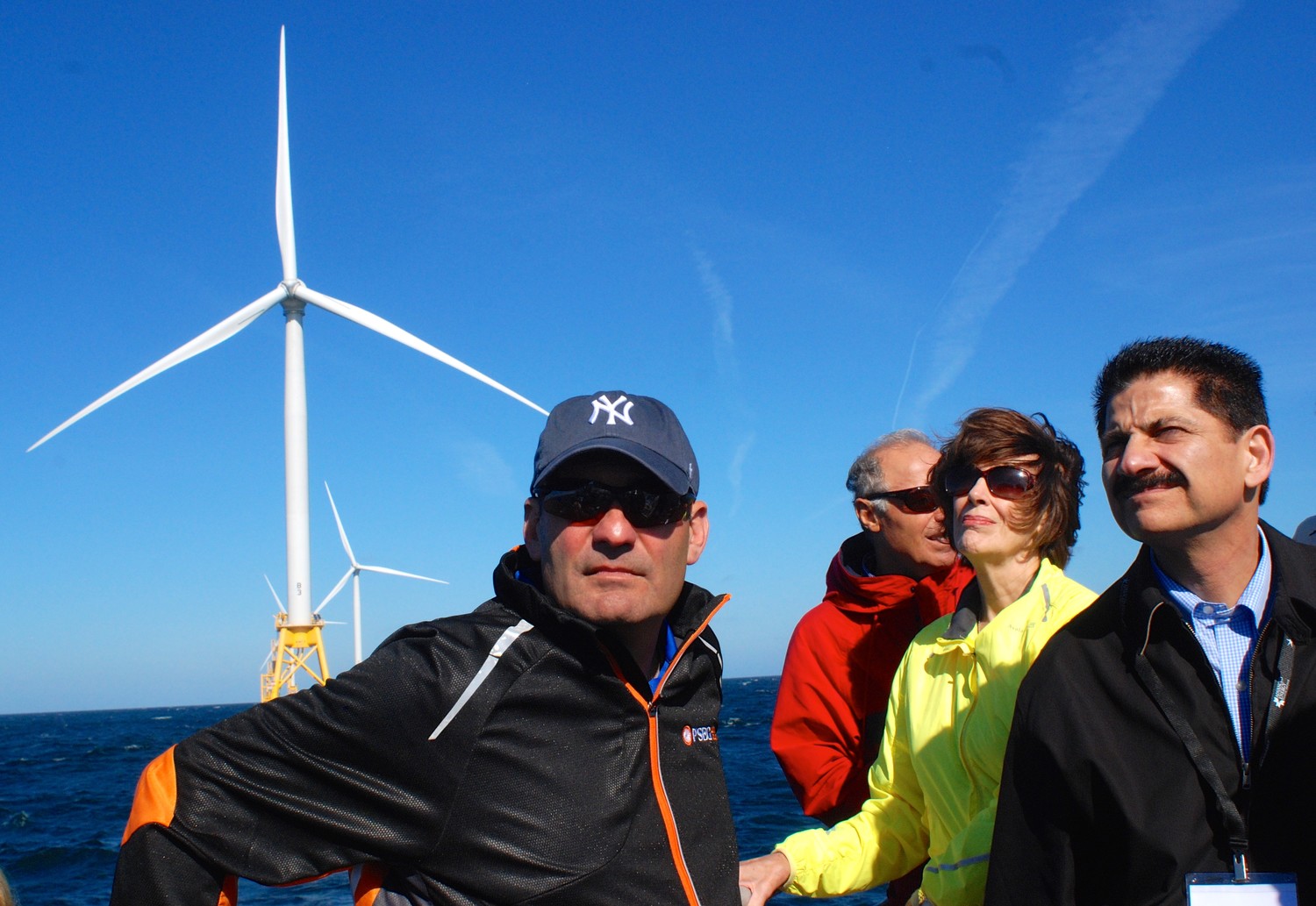 The Long Island Association, in conjunction with Stony Brook University's Advanced Energy Research Center, the Gershow Recycling Corporation and Deepwater Wind, hosted a tour last Wednesday of the wind farm recently constructed three miles off the Block Island coastline. At center, in yellow, was LIA Board of Directors member Katherine Heaviside.