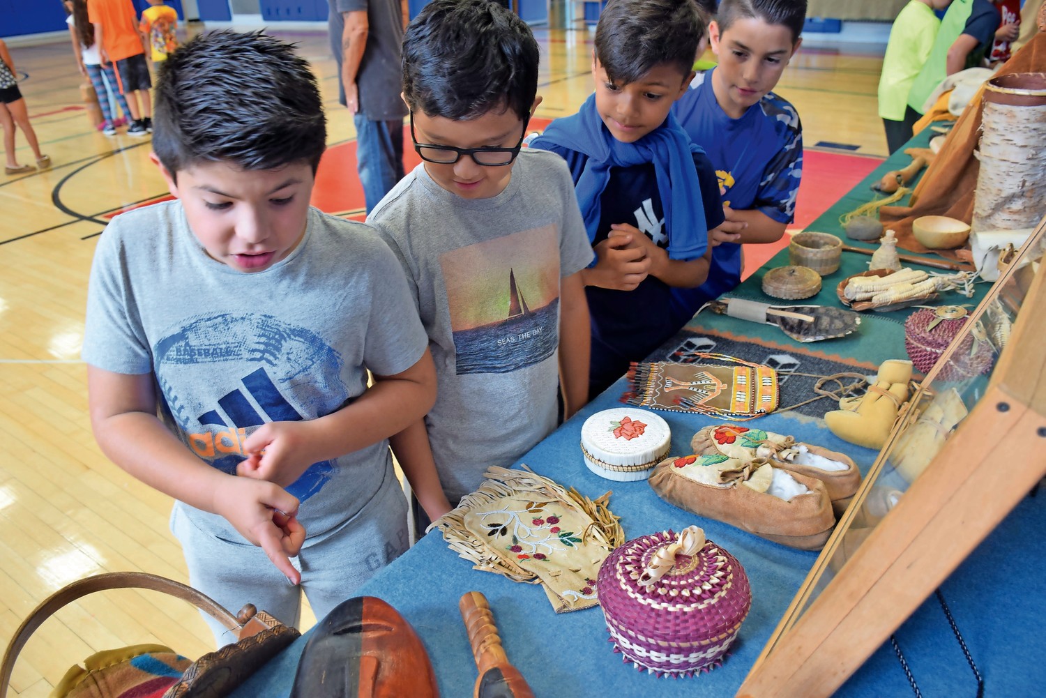 Parkway Elementary School fourth-graders examined American Indian tools during an in-school field trip led by Journeys into American Indian Territory.