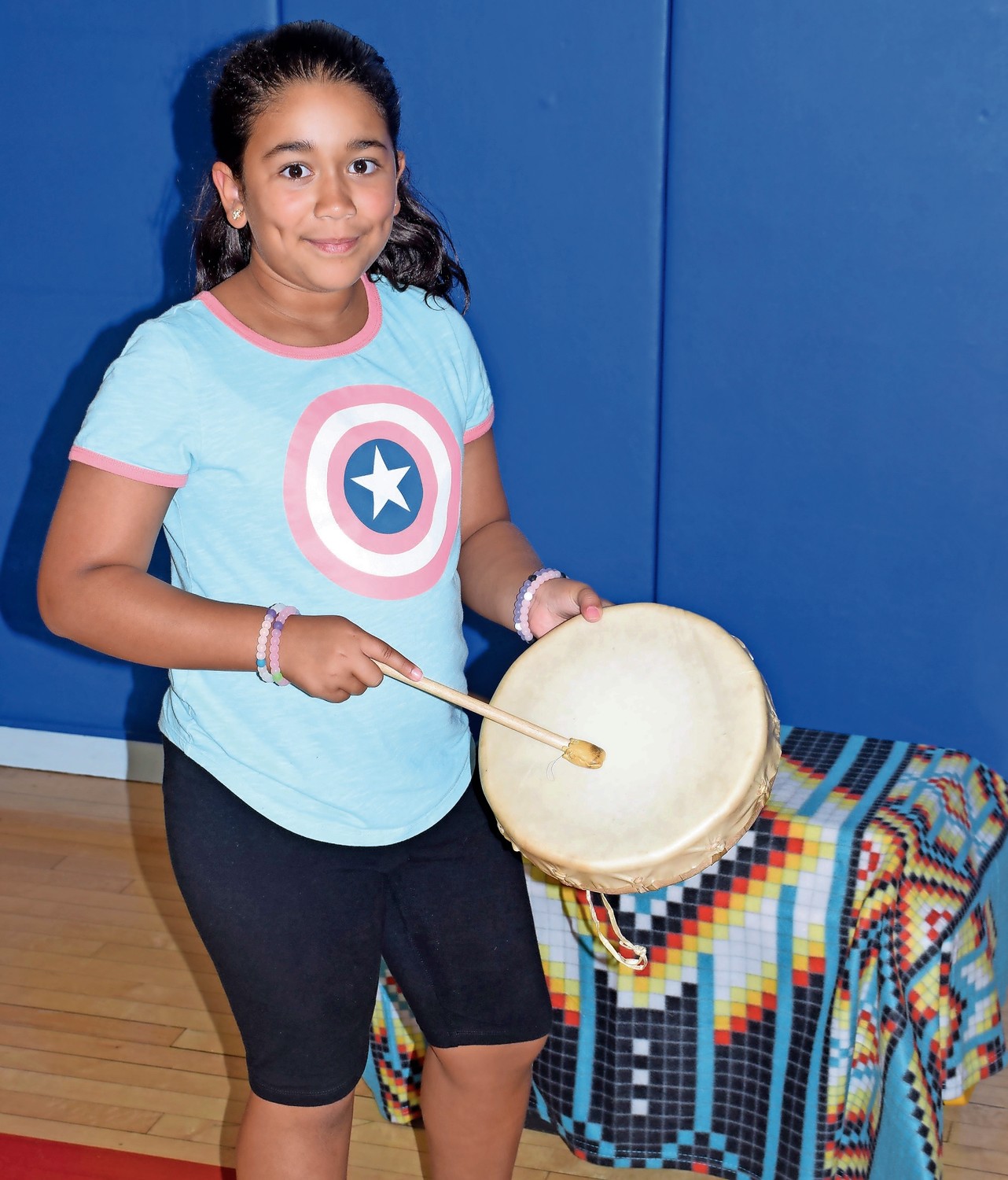 Parkway Elementary School fourth-grader Brianna Almanzar created music by beating a drum.