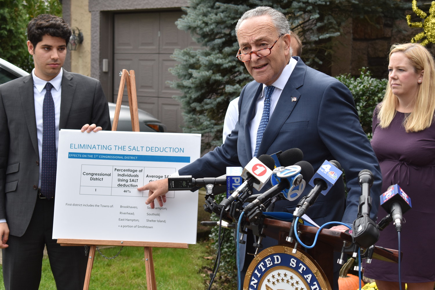 U.S. Senate Minority Leader Charles Schumer rallied against the repeal of state and local tax deductions in Rockville Centre on Oct. 12.