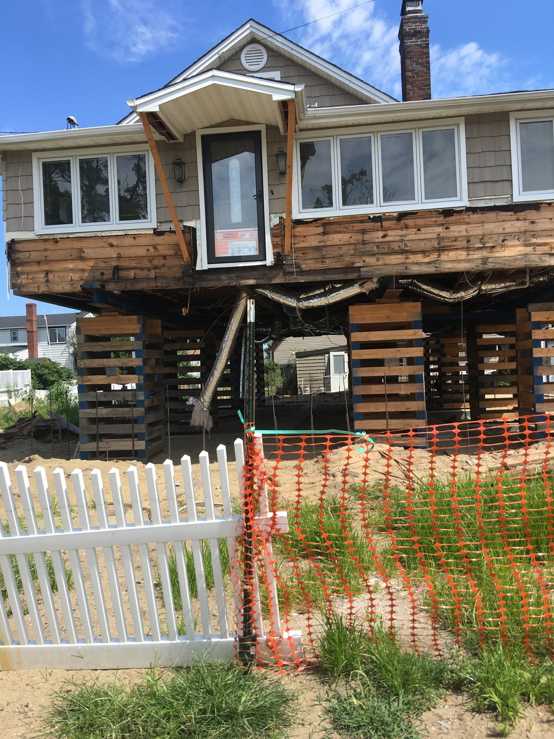 Donna Prisciandaro said that her Bay Park home was suspended in the air on stilts for 11 months after two contractors — one of whom was Lee Moser — took money from her to raise it and did not finish the job.