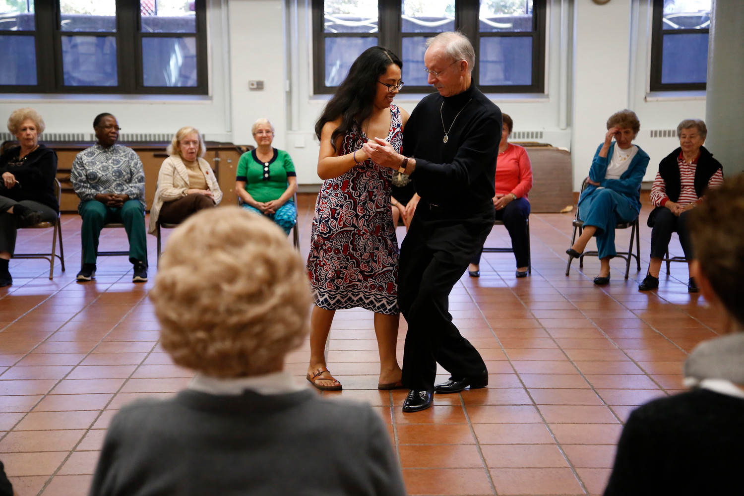 Ferrara and dance partner Nicole Almario demonstrated salsa techniques for the New and Vibrant Over 50s Club.