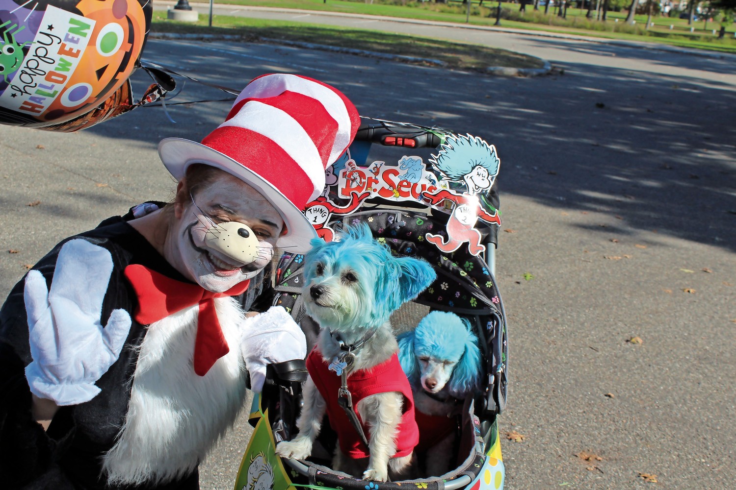 Linda Troy, of Valley Stream, won first-place in the Best Group Costume category for dressing her dogs up as ‘Thing 1’ and ‘Thing 2’ from the Dr. Seuss book “The Cat in the Hat.”