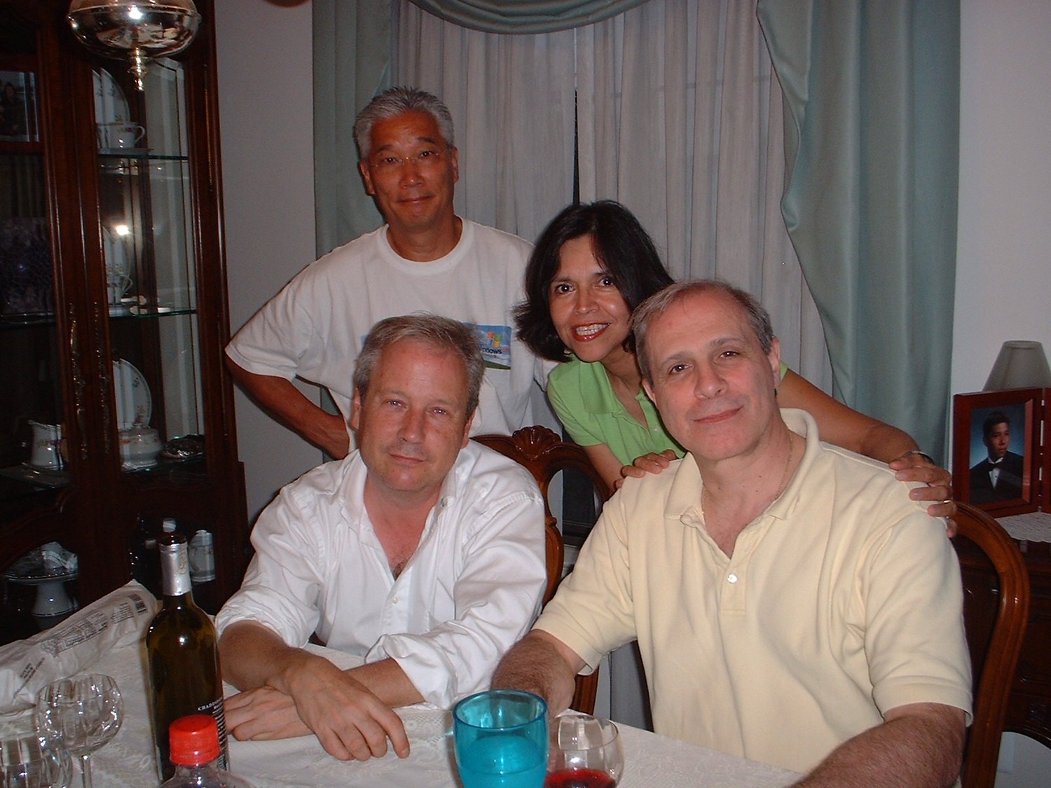 Leonard Durso, second from left, grew up in Lynbrook with his foster brother Johnny Ding, left, and his brother Robert McMannis. Also pictured is his sister-in-law Cecelia Ding.