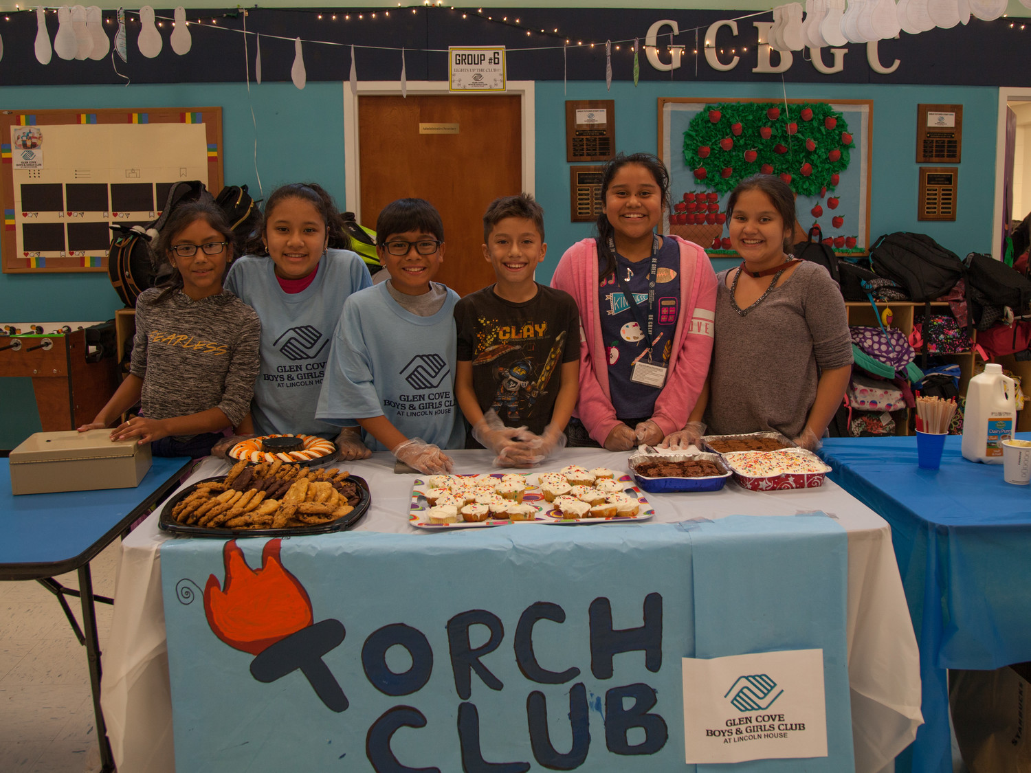 Angie Mendoza, left, Yesica Valladares, Daniel Hernandez, Jabier Escobar, Yamna Vigil, and Ashley Najarro sold baked goods for the GCB&GC’s Torch Club at the Lights on Afterschool.