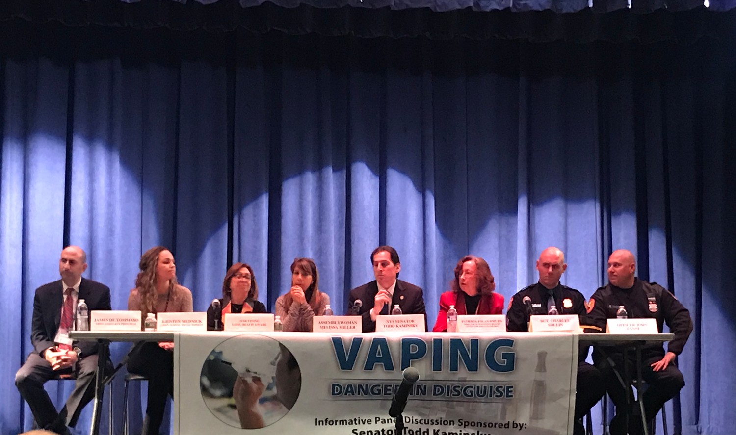 Vaping was the subject of a forum at East Rockaway Junior-Senior High School last week. Among the speakers were, from left, James DeTommaso, the high school’s assistant principal; Kristen Mednick, a school social worker; Judi Vining, executive director of Long Beach Aware; State Assemblywoman Melissa Miller; State Sen. Todd Kaminsky; Patricia Folan, director of the Northwell Health Center for Tobacco Control; Nassau County Police Sgt. Charles Solan; and NCPD Officer John Zanni.