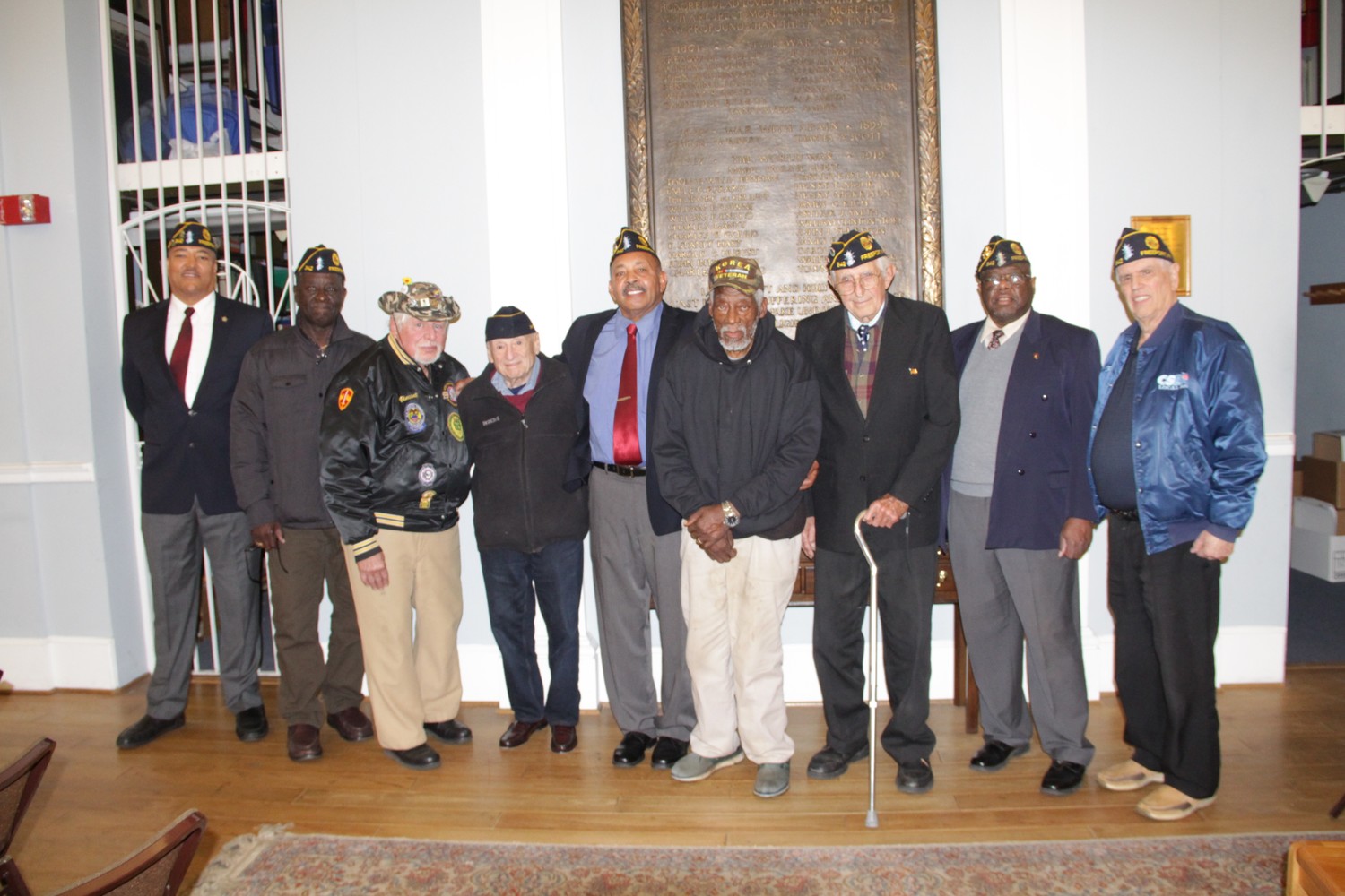 American Legion William Clinton Story Post 342 members after the Pearl Harbor Observance and Memorial Ceremony. From left were 3rd Vice Cmdr. David Jones, Treasurer Calvin Andrew, Vincent Mientes, Cmdr. Coy Richardson, Moses Isaacs, Past Cmdr. Paul Nehrich and 1st Vice Cmdr. David Cockerel.