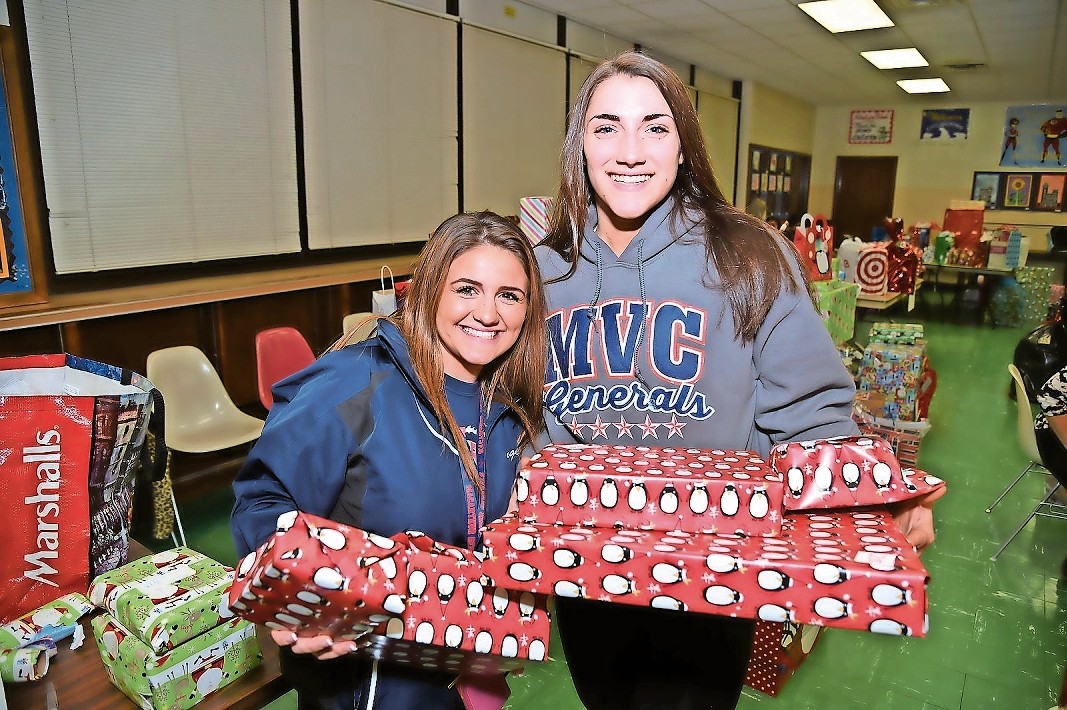 MacArthur students Jackie Langellotti and Danielle Zangrillo helped out at the district-wide event last year.