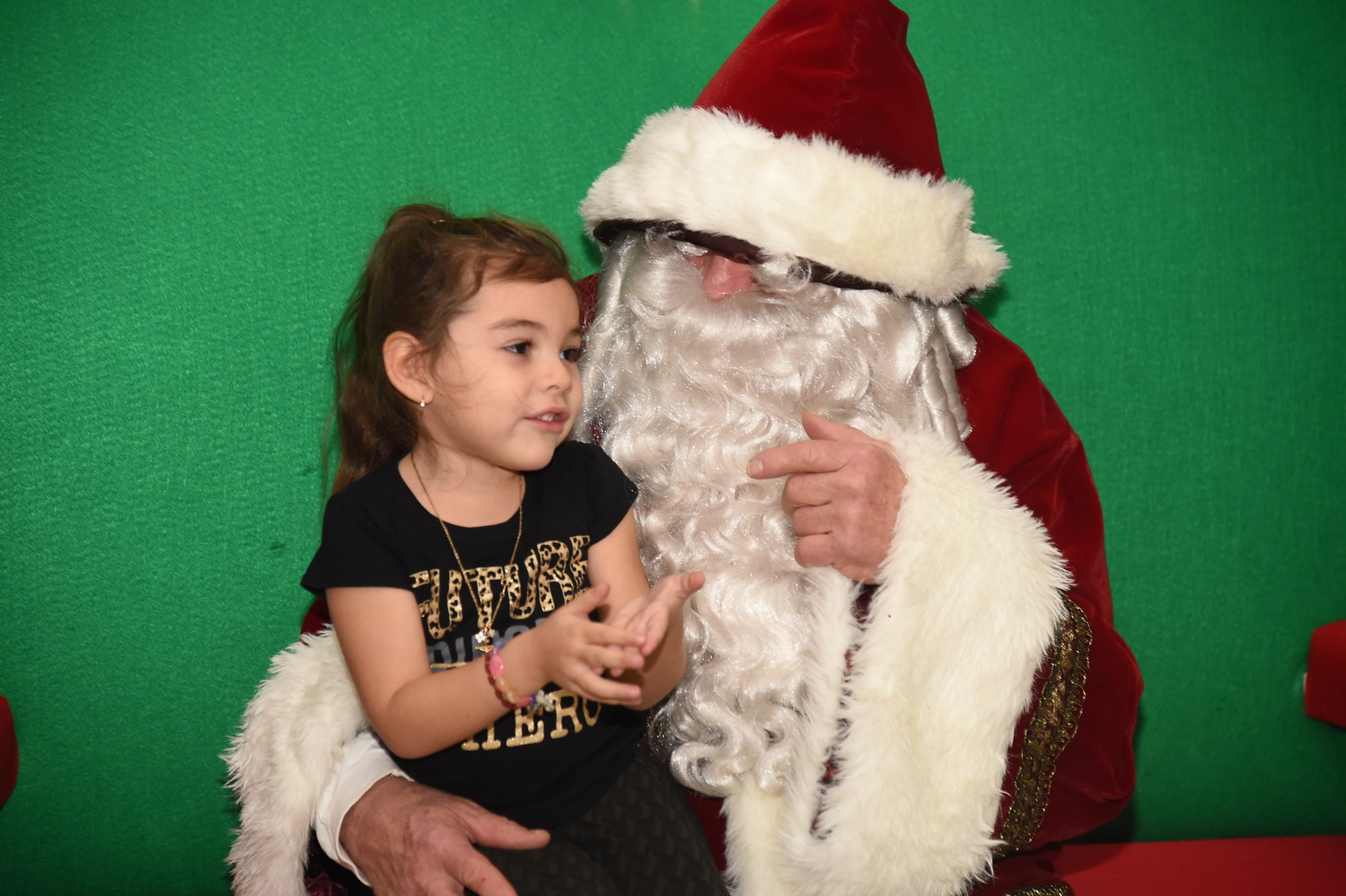 Freeporter Savannah Pichardo,5 timidly shared with Santa her Christmas wish list.
