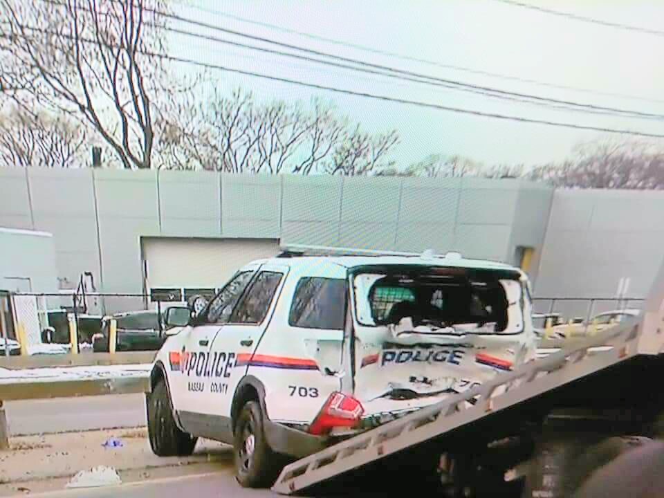 A Nassau County police officer was hospitalized after a car crash in Seaford Friday morning.