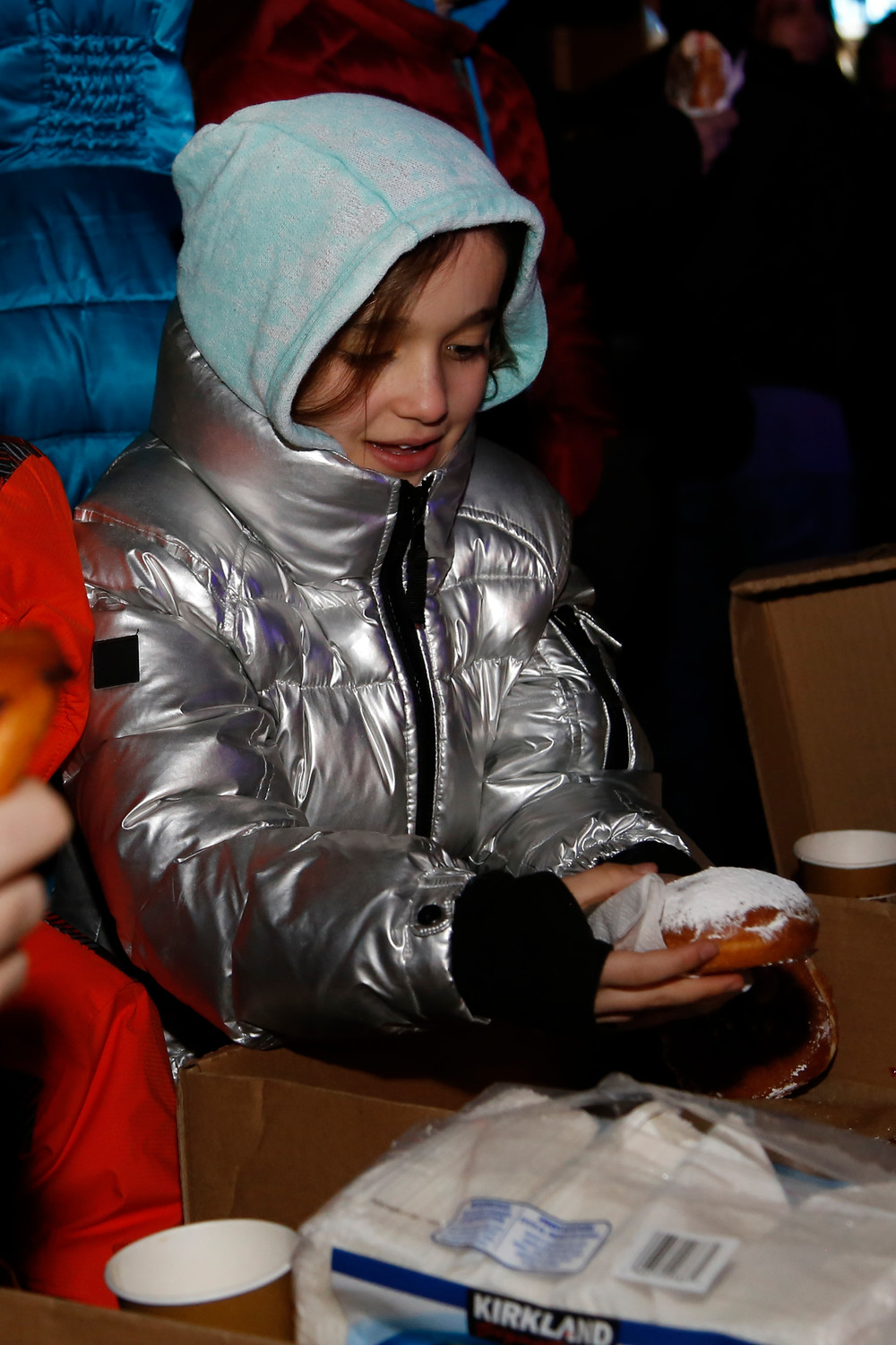 Mikayla Afriat, 10, grabbed one of the last jelly donuts.