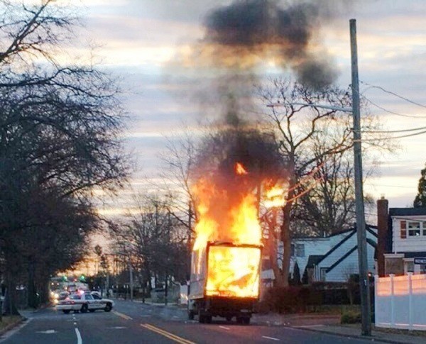 A truck was engulfed in flames at the intersection of East Meadow Avenue and Stone Avenue on Dec. 21.